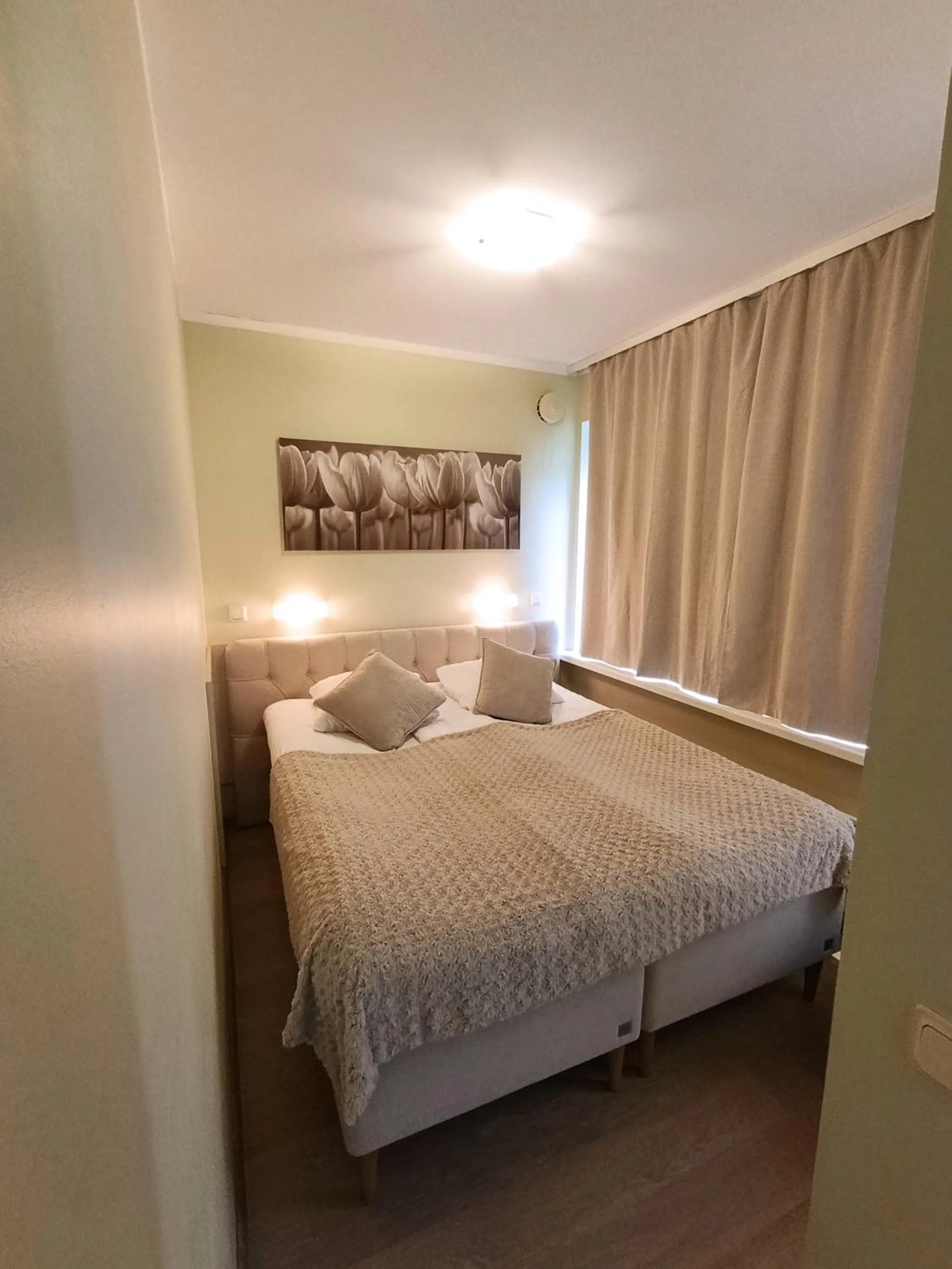 Bed in Inge Villa Apartment Hotel