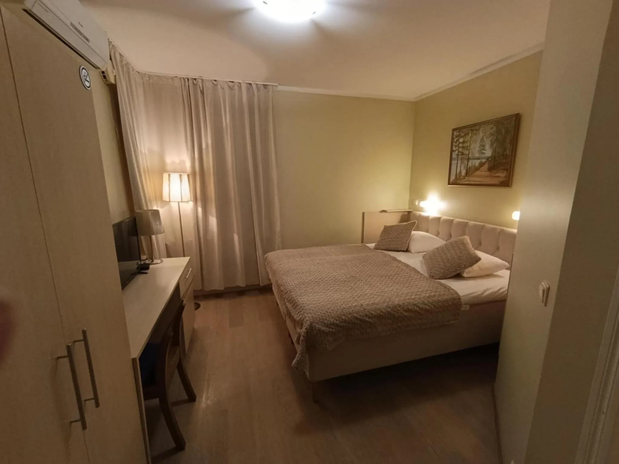 Bed in Inge Villa Apartment Hotel