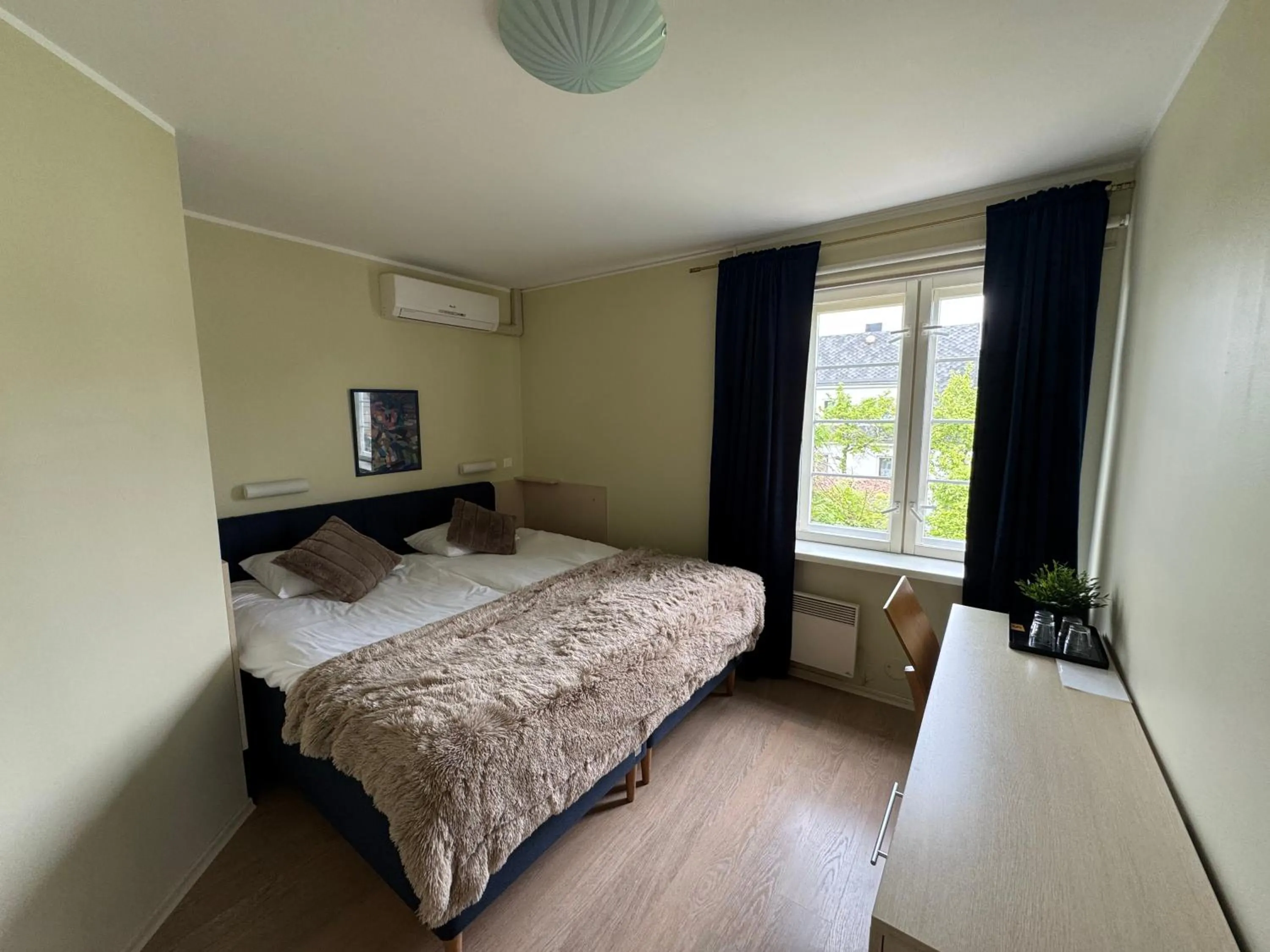 Bed in Inge Villa Apartment Hotel