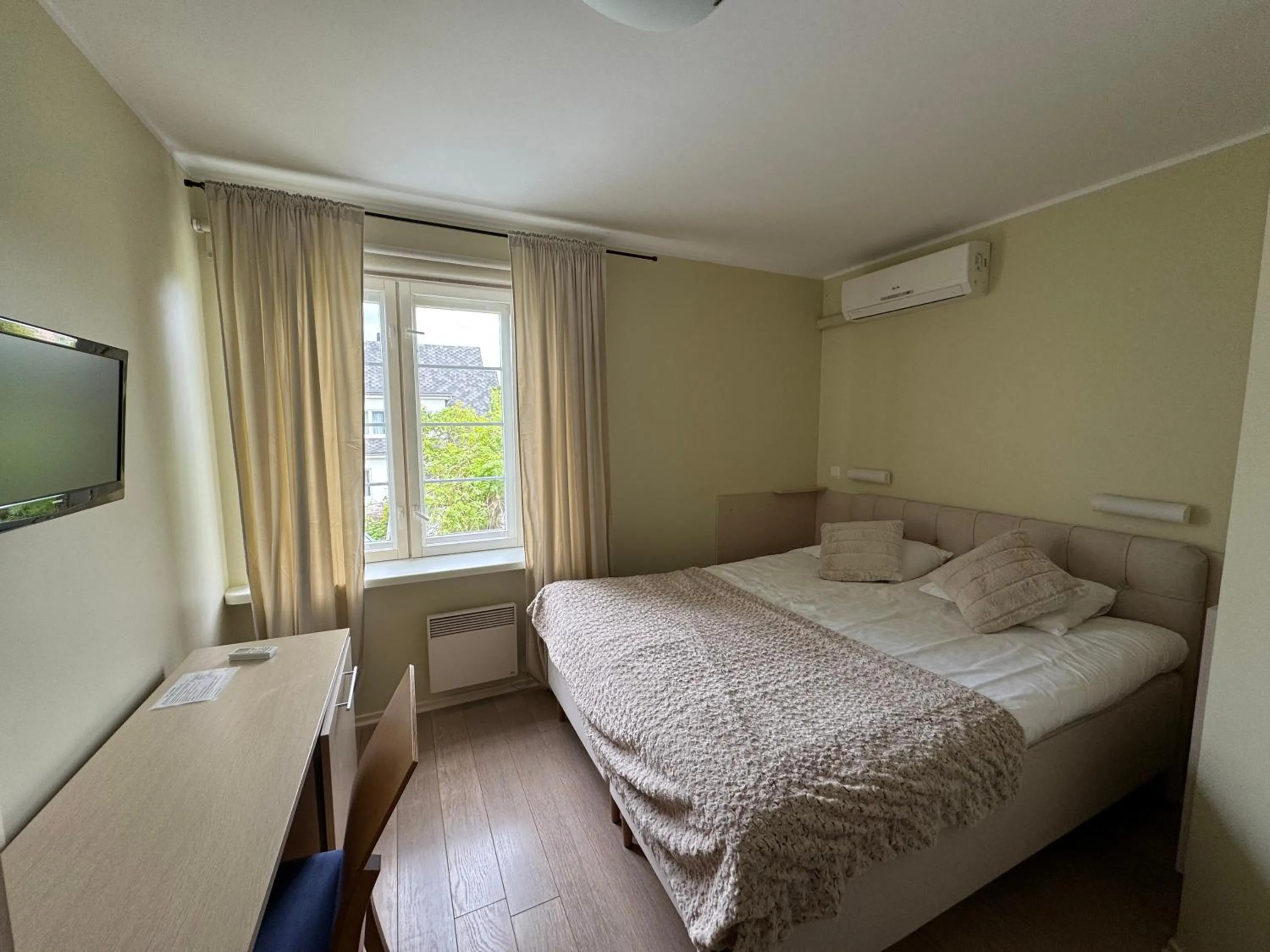 Bed in Inge Villa Apartment Hotel
