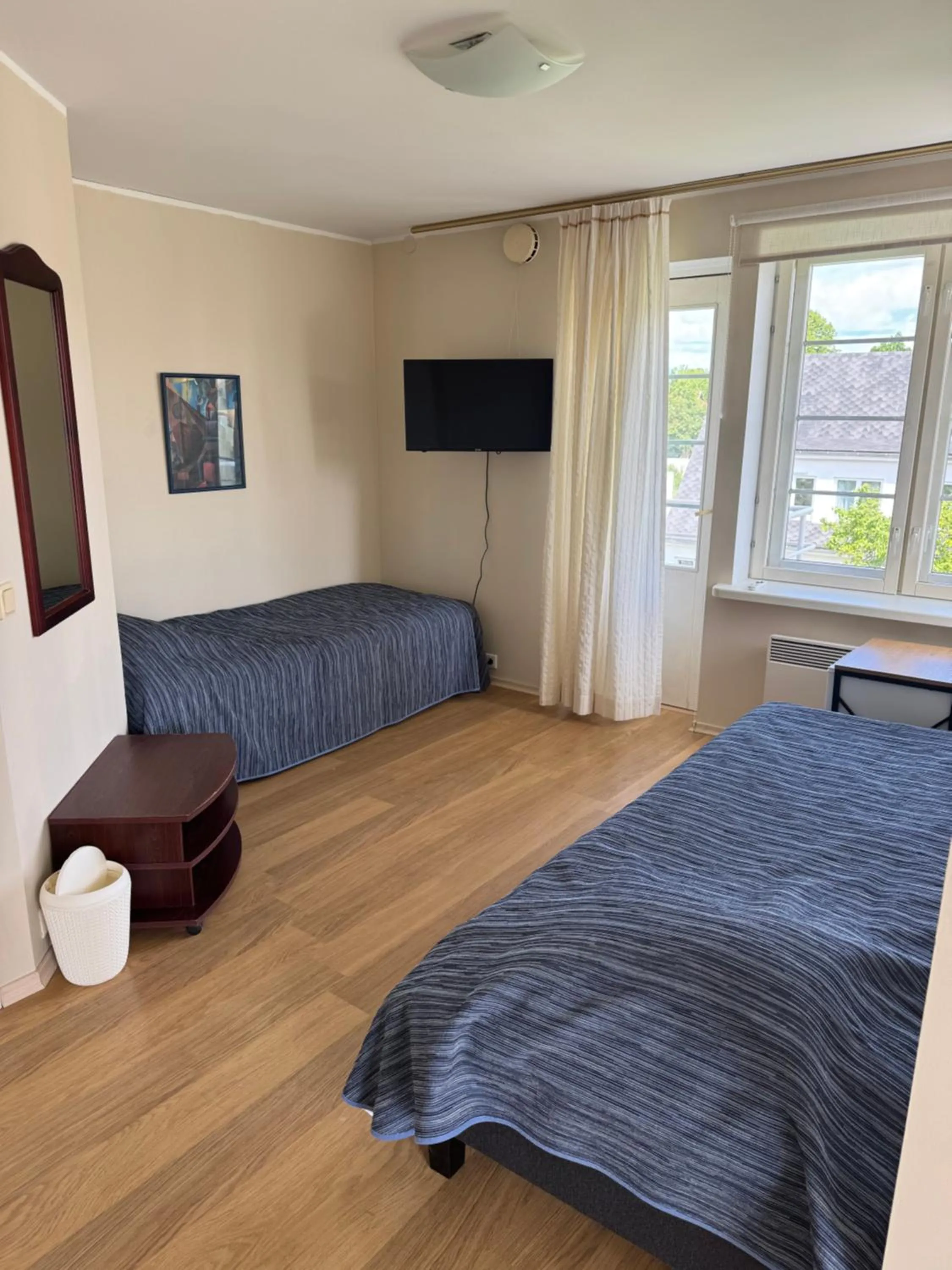 Bed in Inge Villa Apartment Hotel
