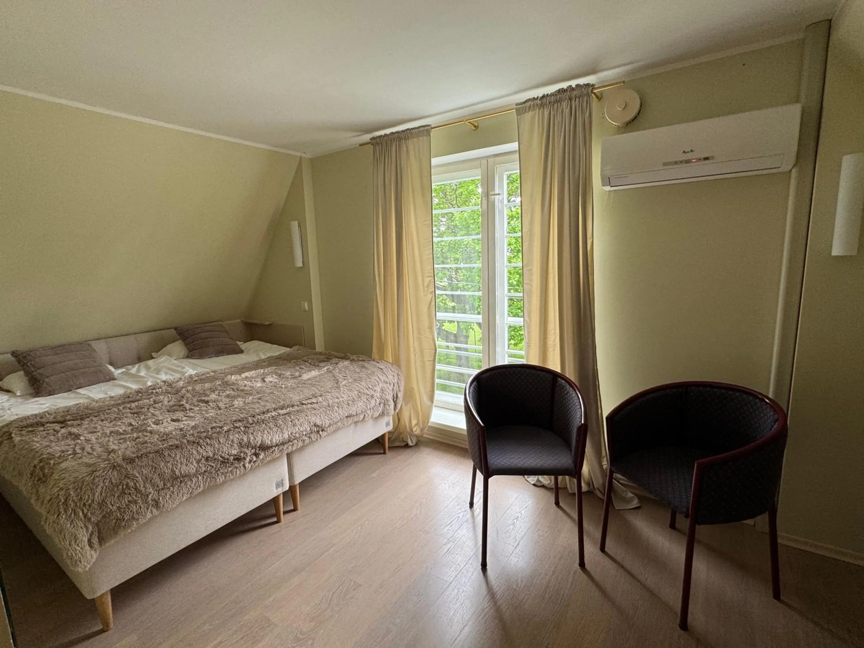 Bed in Inge Villa Apartment Hotel