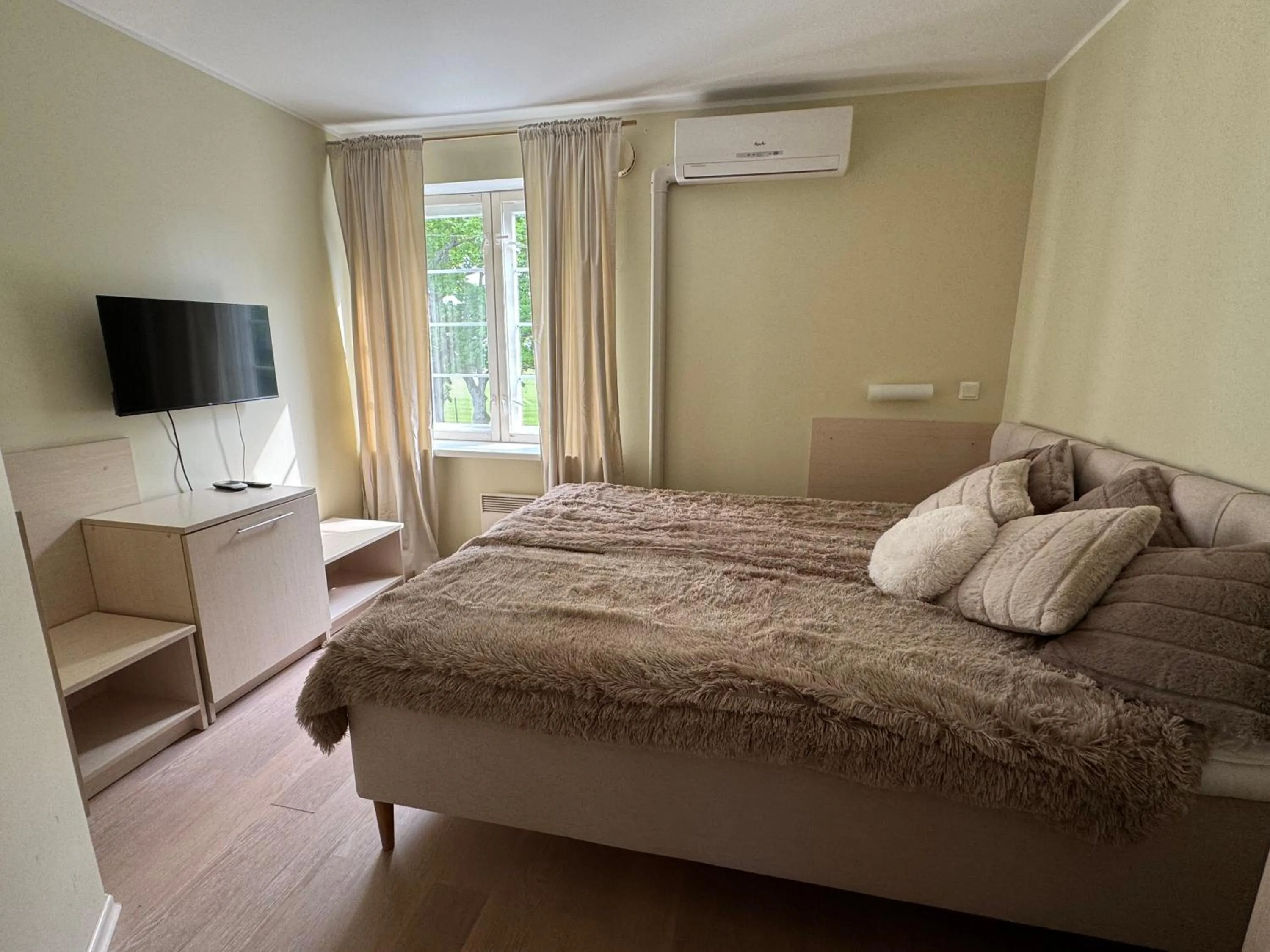 Bed in Inge Villa Apartment Hotel