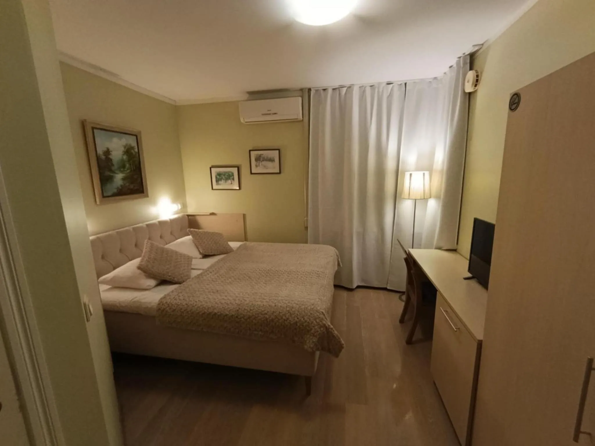 Bed in Inge Villa Apartment Hotel
