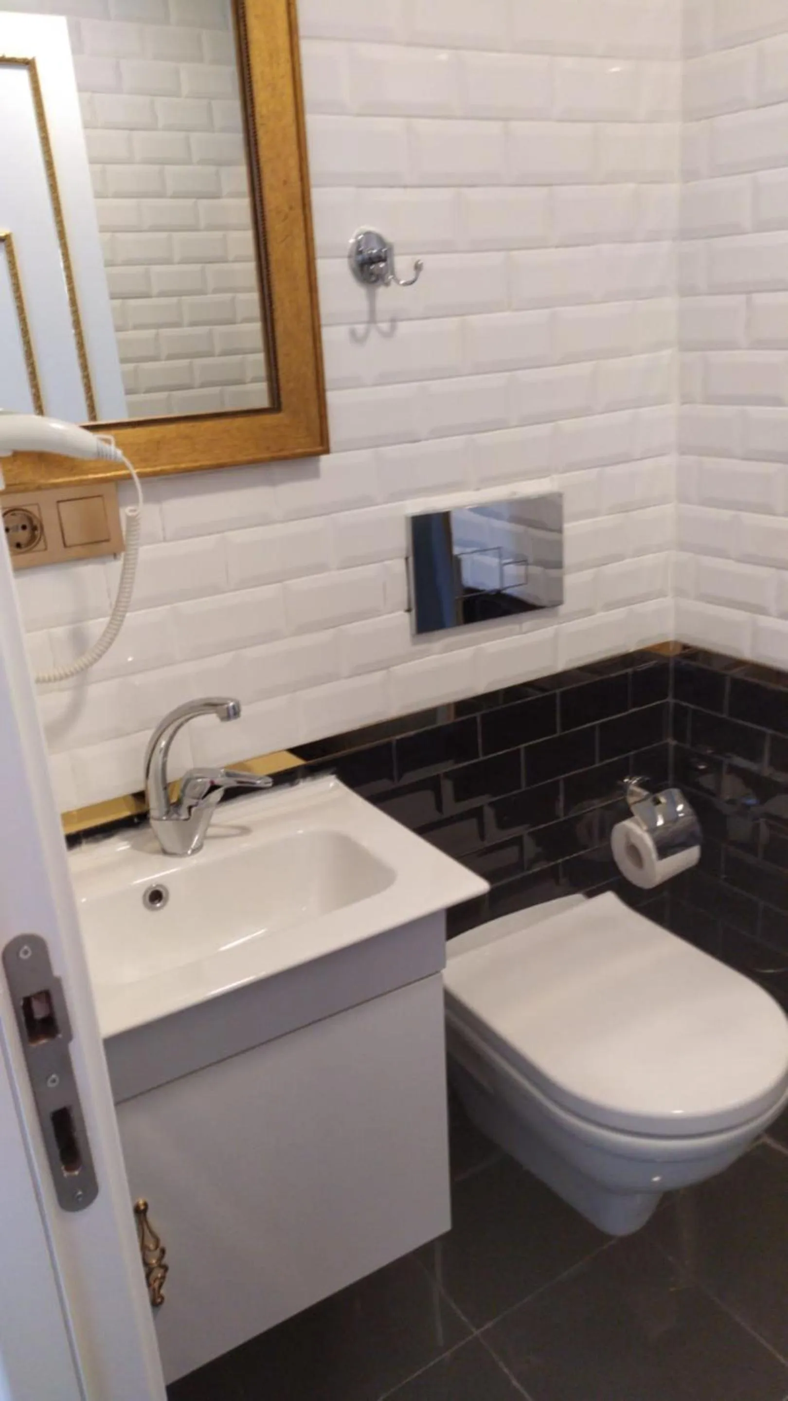 Bathroom in RHYTHM HOTEL