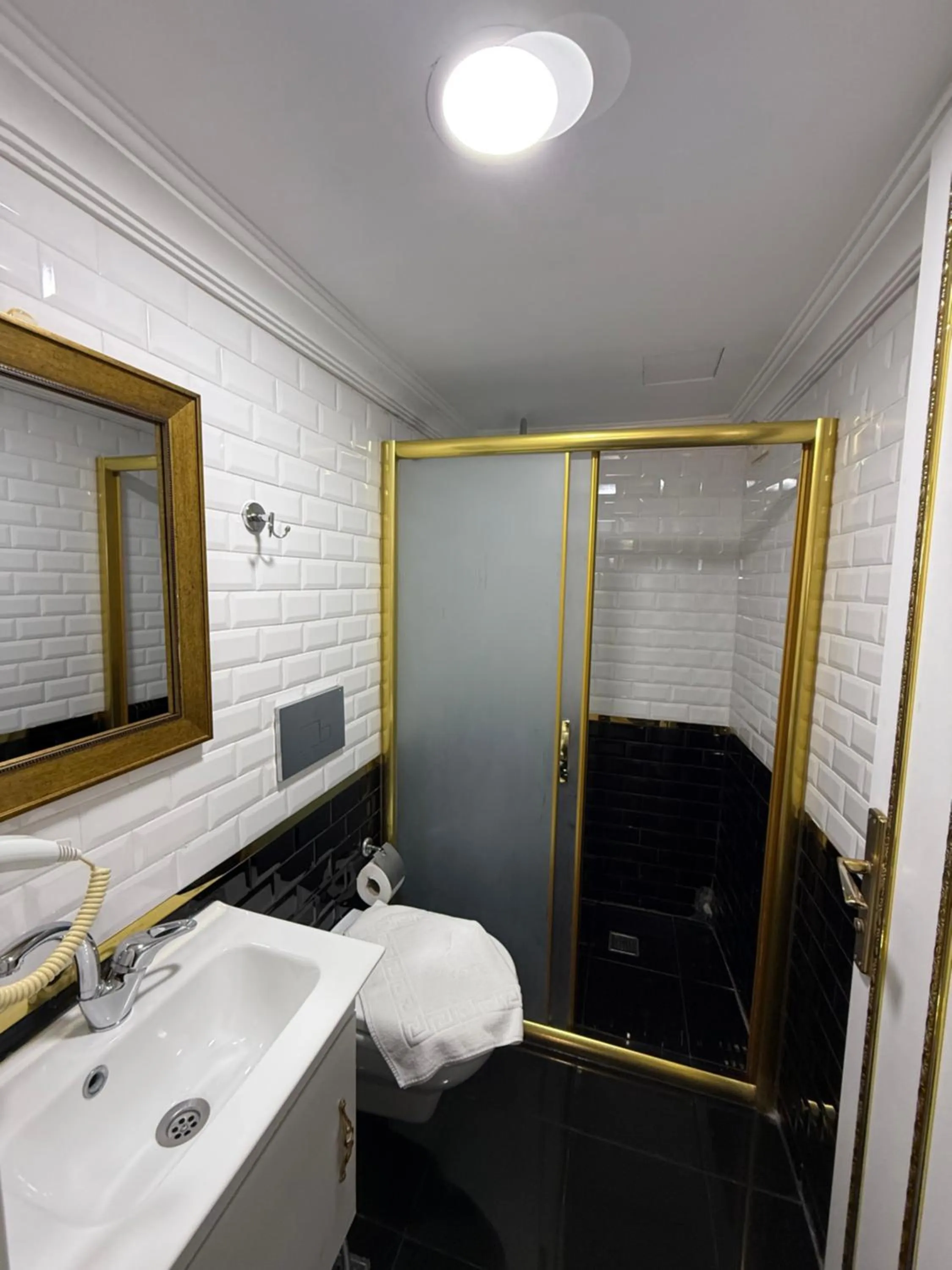 Bathroom in RHYTHM HOTEL