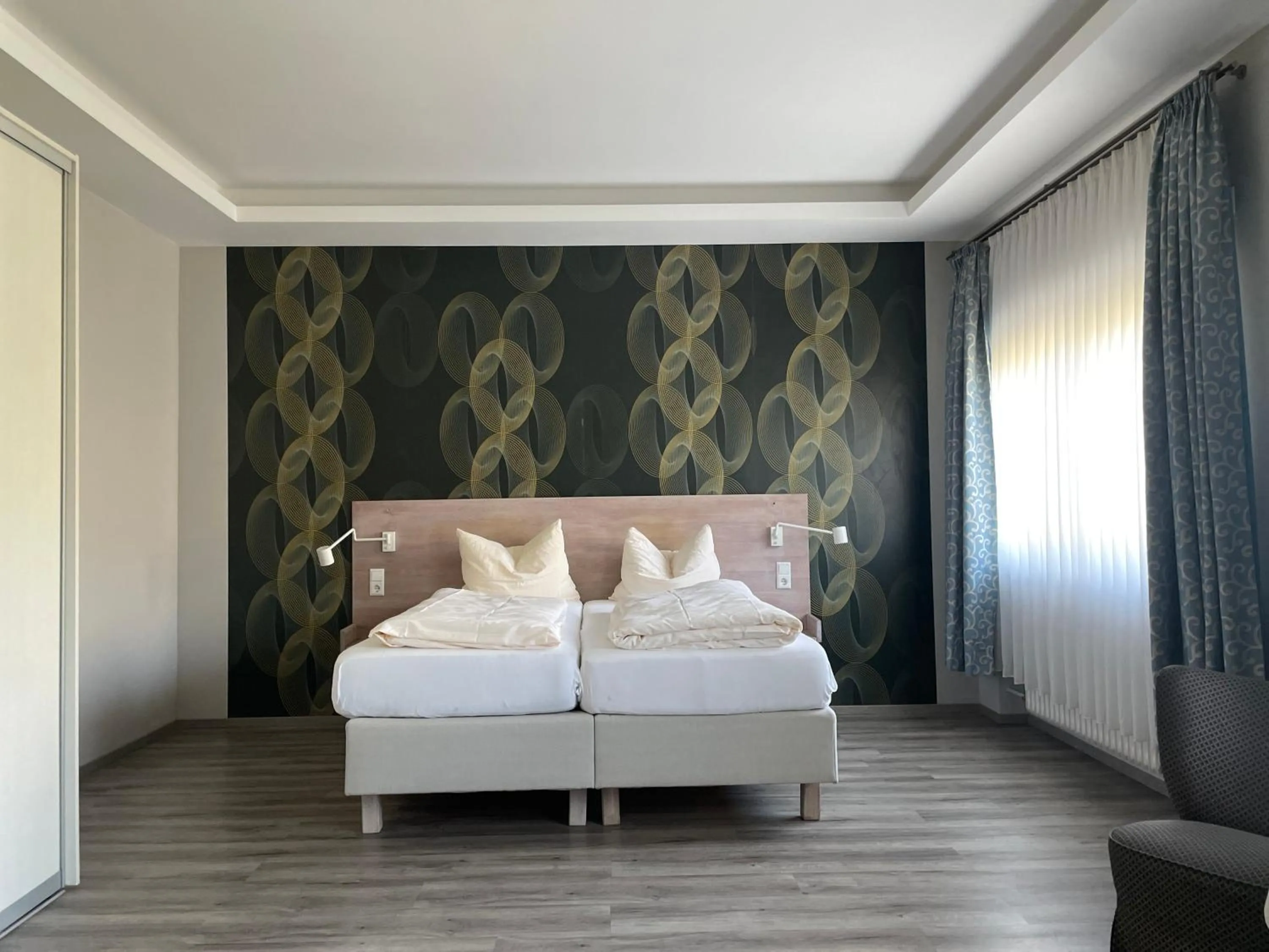 Photo of the whole room, Bed in Hotel Markgräfler Hof