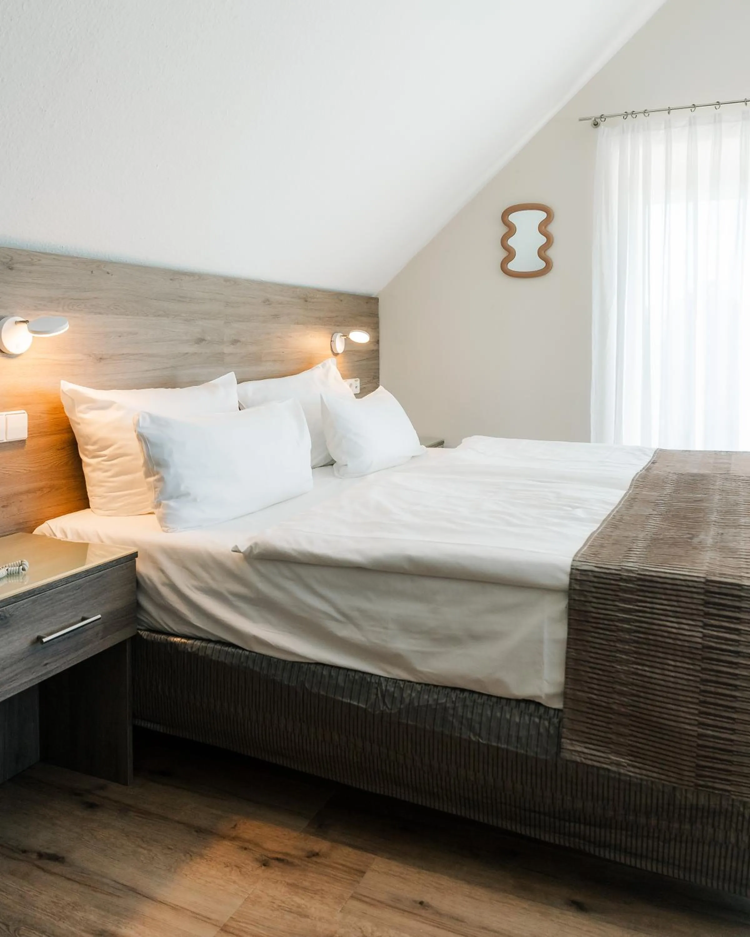 Bed in Hotel An der Wasserburg