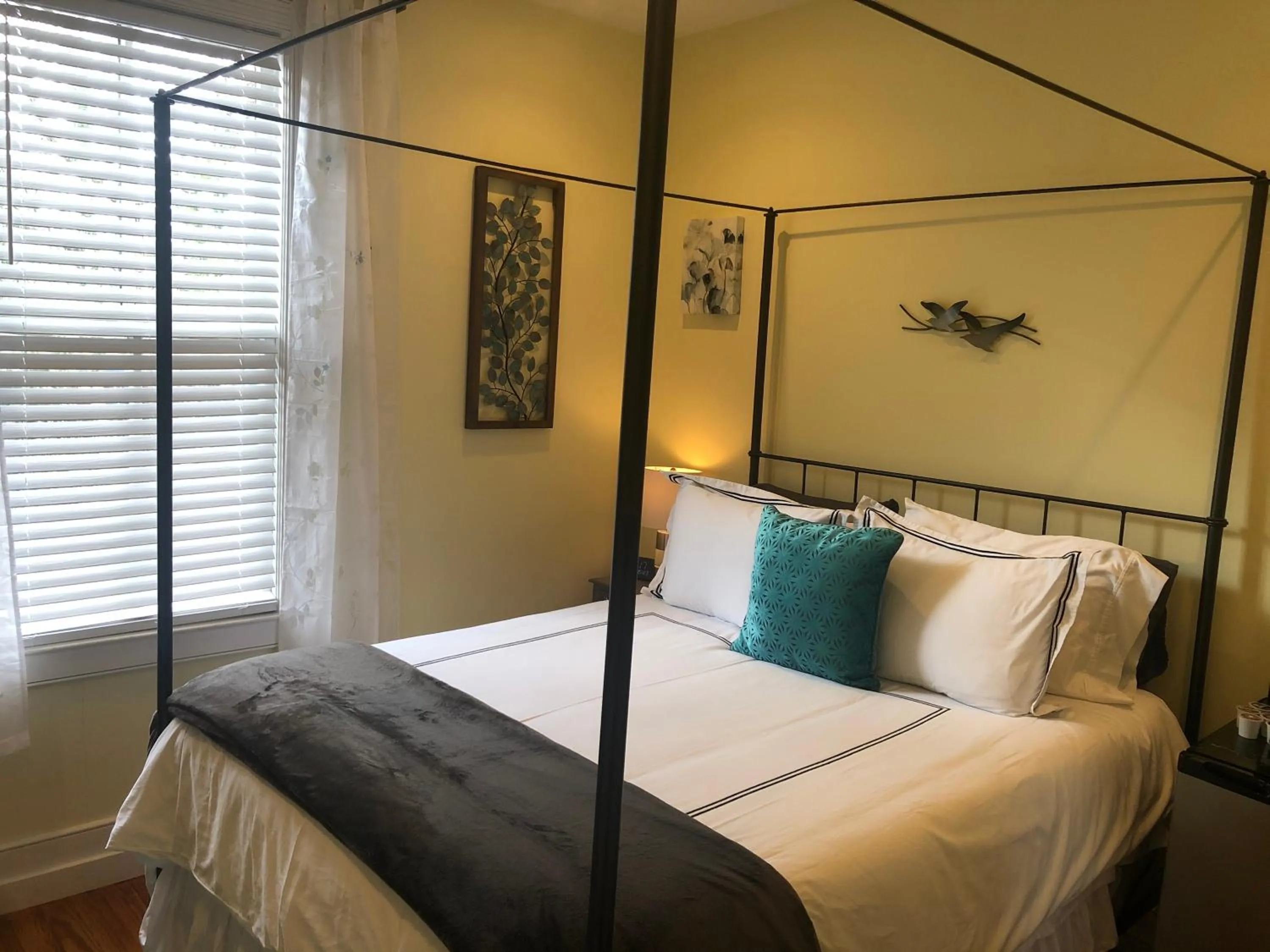 Bed in Luxurious Private Suites in Downtown Charleston