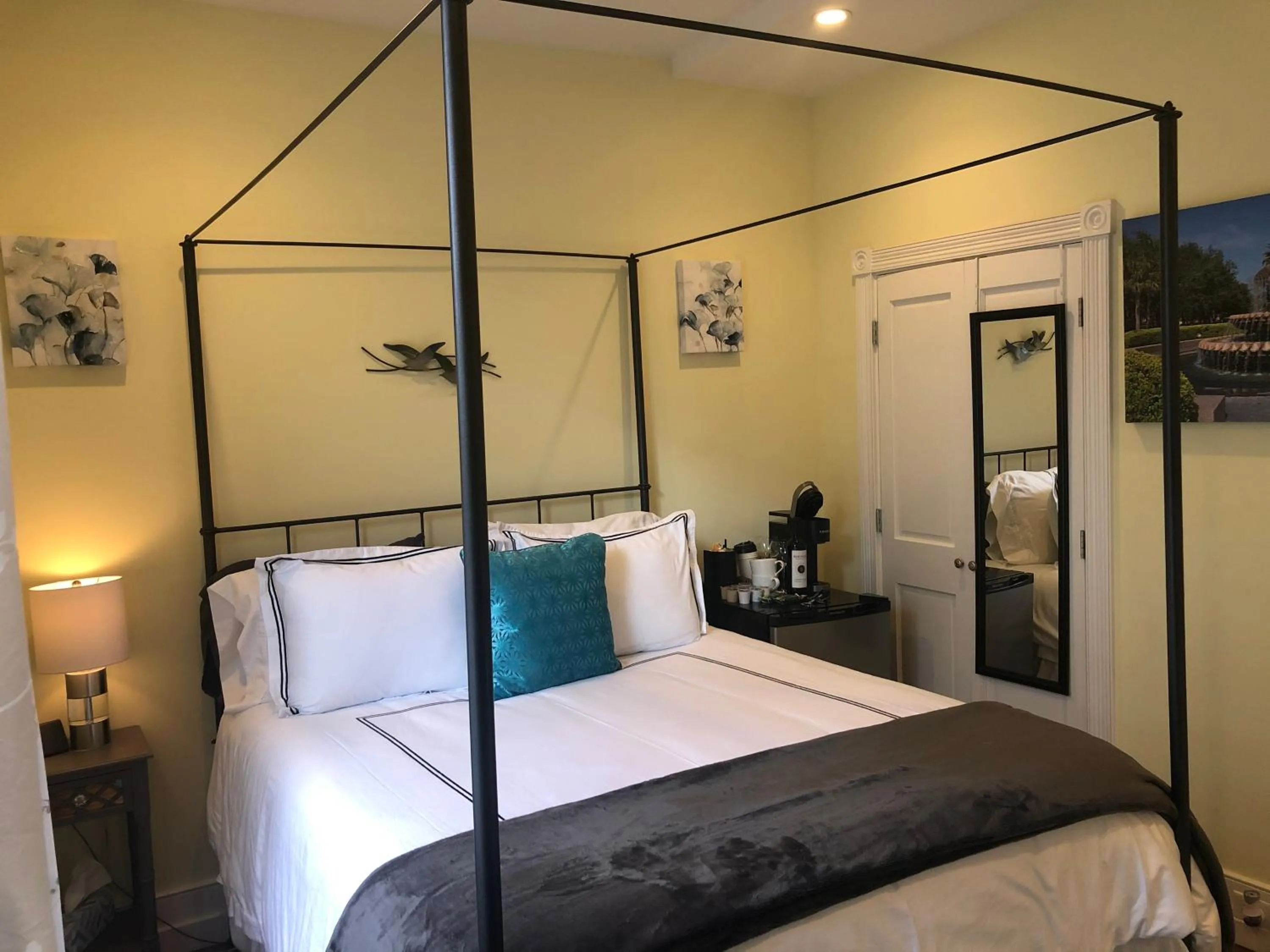 Bed in Luxurious Private Suites in Downtown Charleston