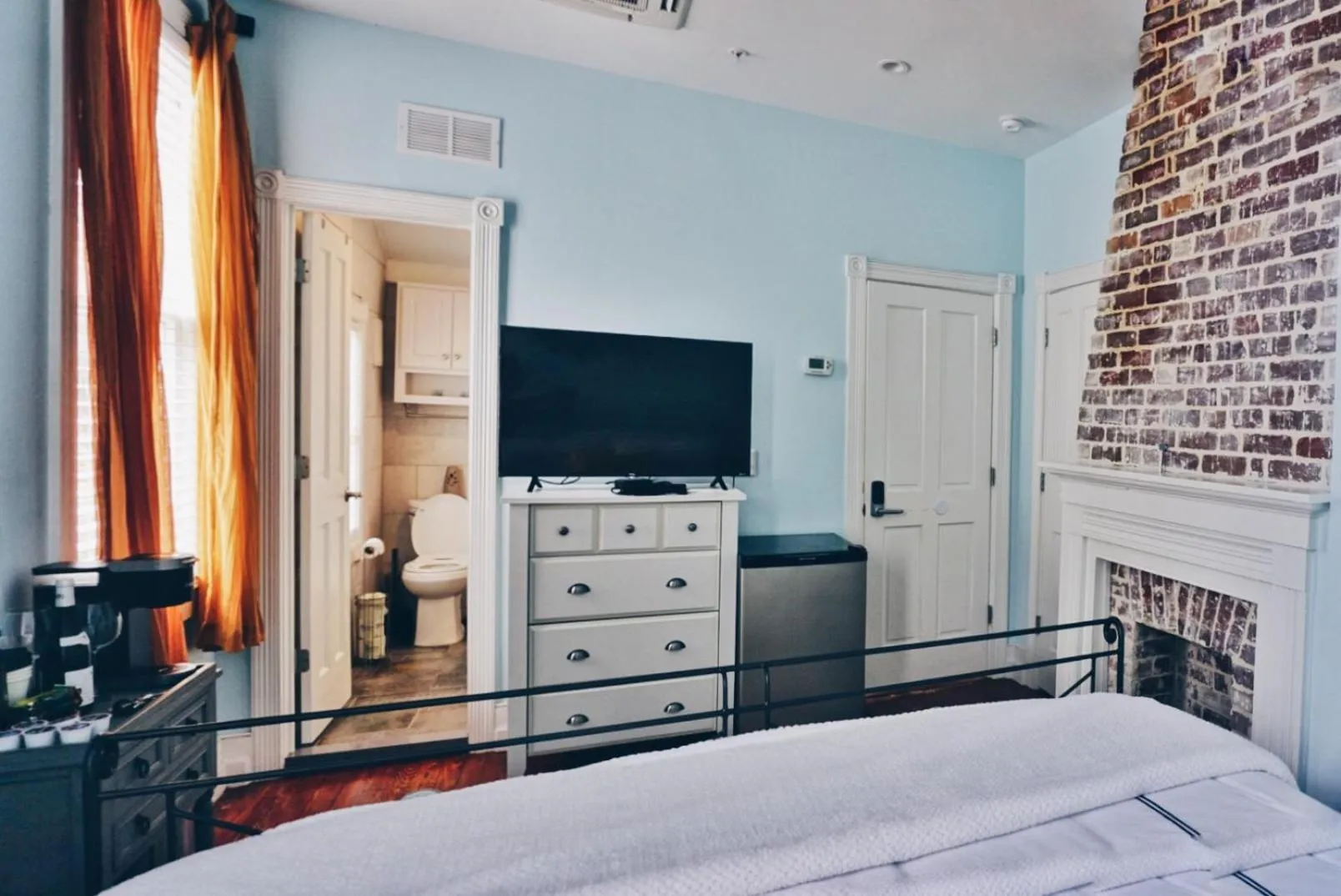 Bed in Luxurious Private Suites in Downtown Charleston