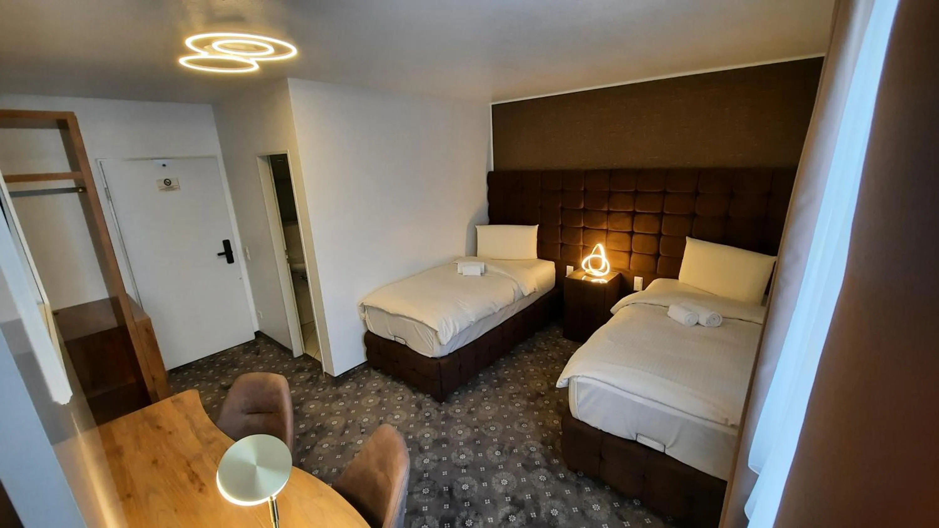 Photo of the whole room, Bed in Hotel Rüttenscheider Stern