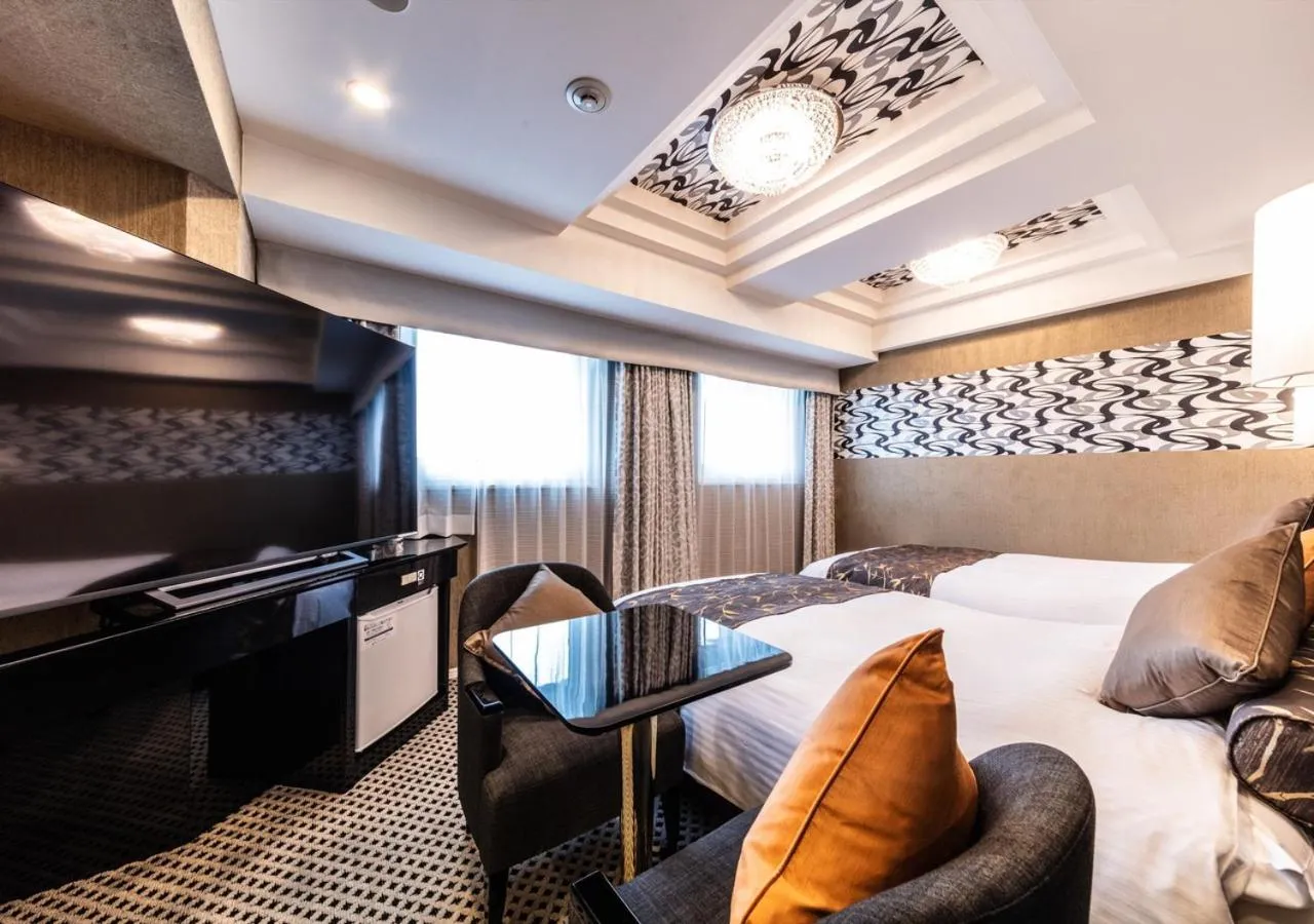 Photo of the whole room, Bed in APA Hotel Higashi Shinjuku Kabukicho Tower