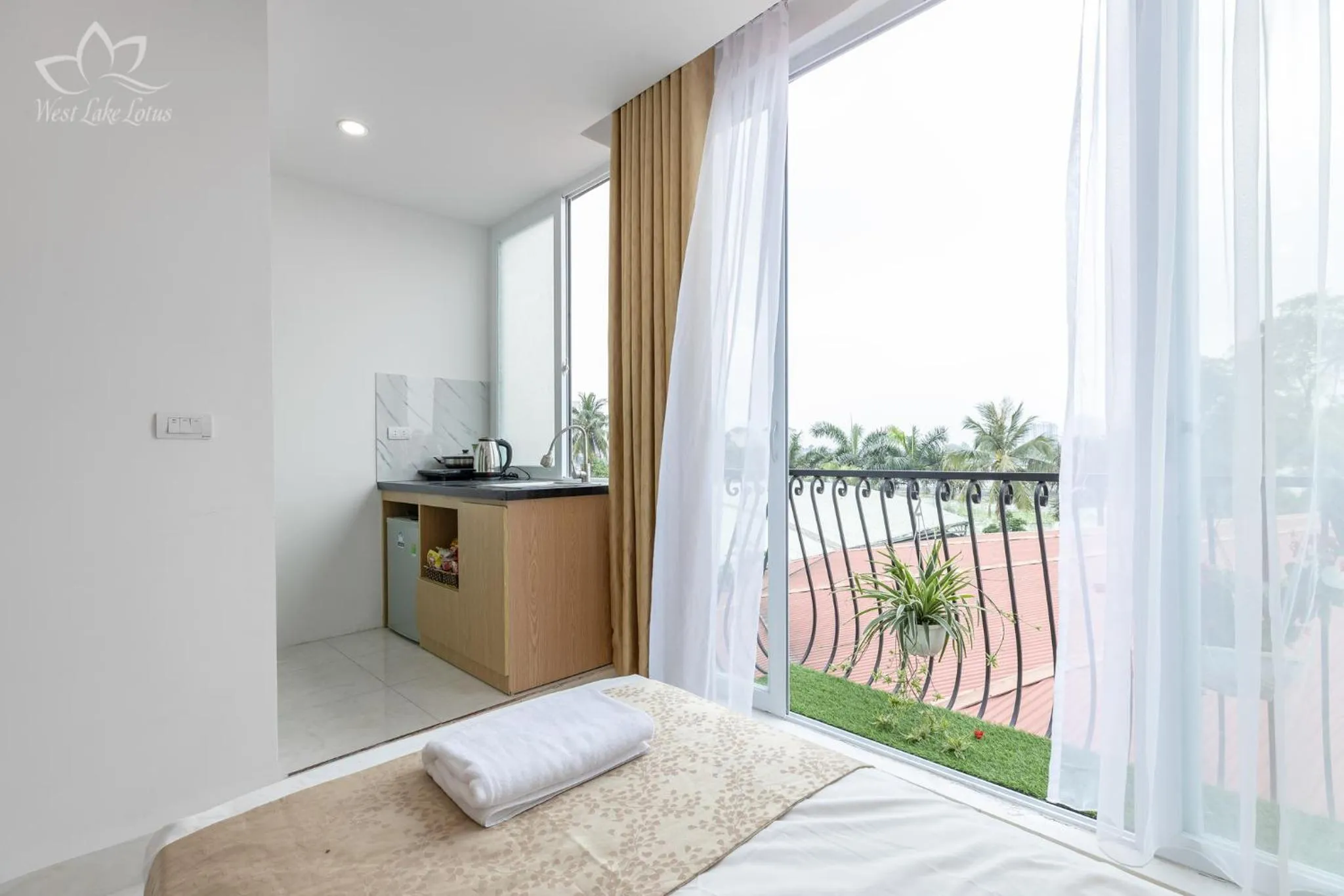 Balcony/Terrace, Bed in The Lakeview - West Lake Lotus Apartments