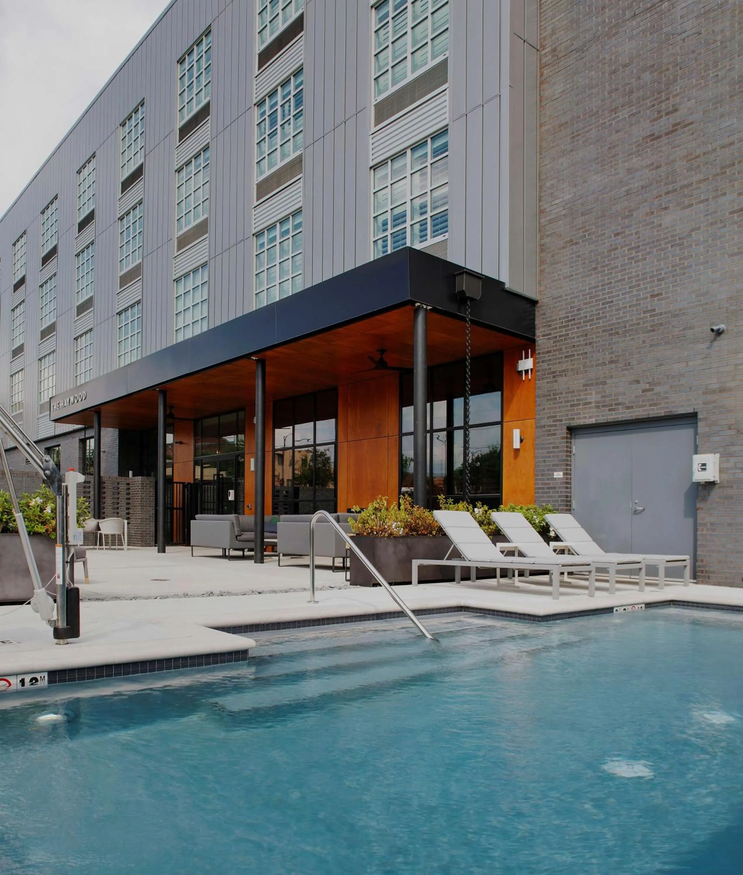 Pool view in The Haywood, Tapestry Collection by Hilton