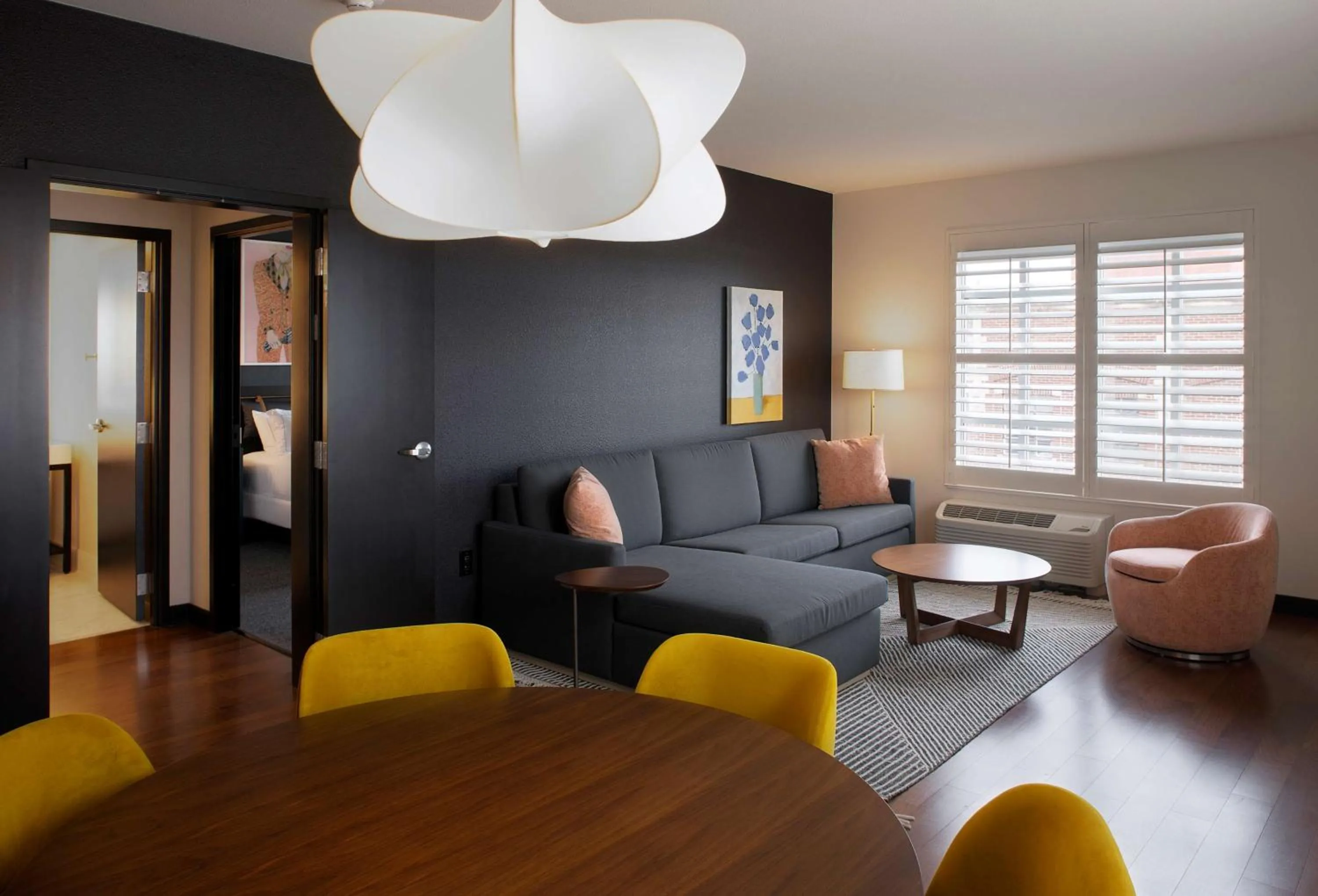 Living room in The Haywood, Tapestry Collection by Hilton