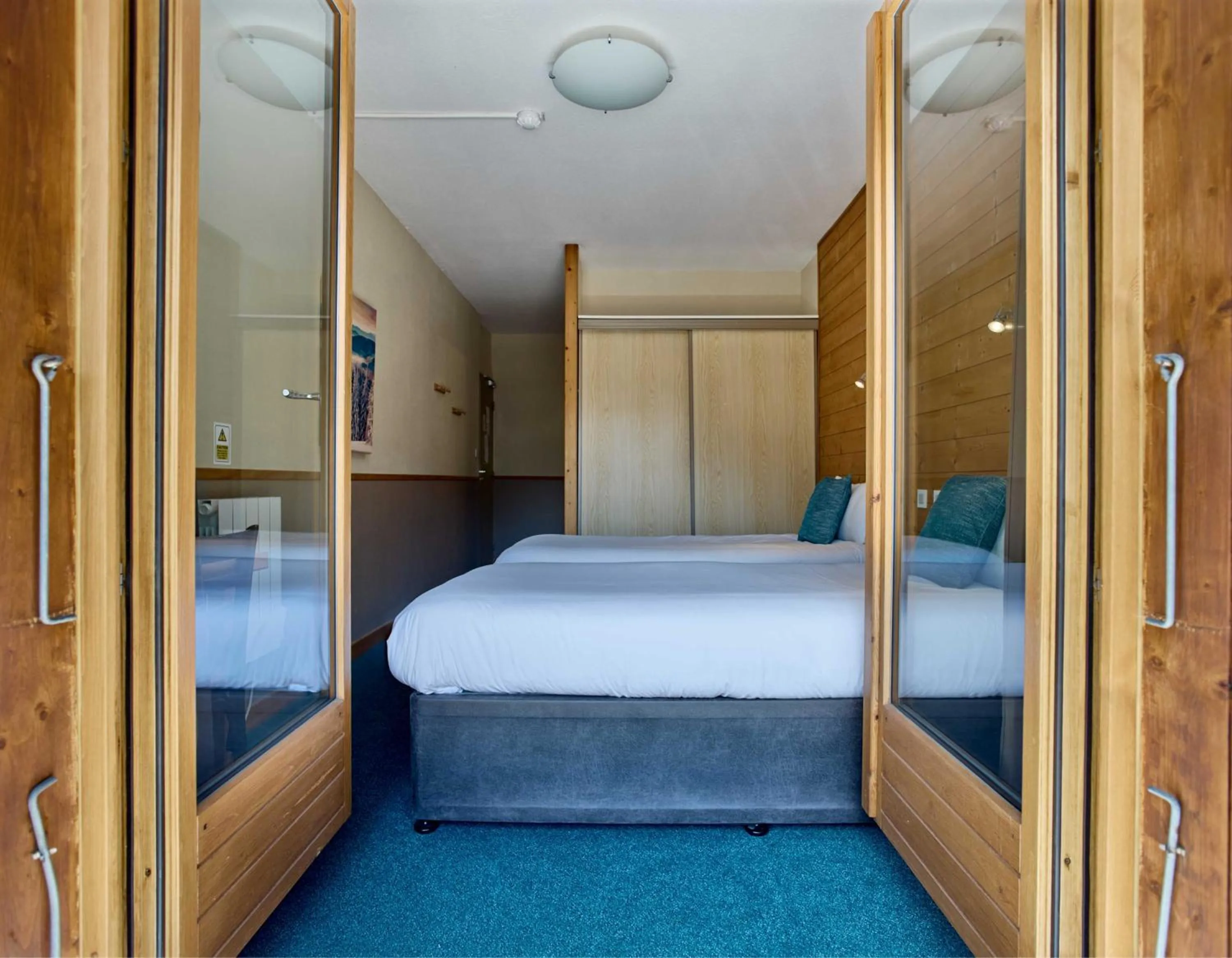 Bed in Hôtel Les Grangettes