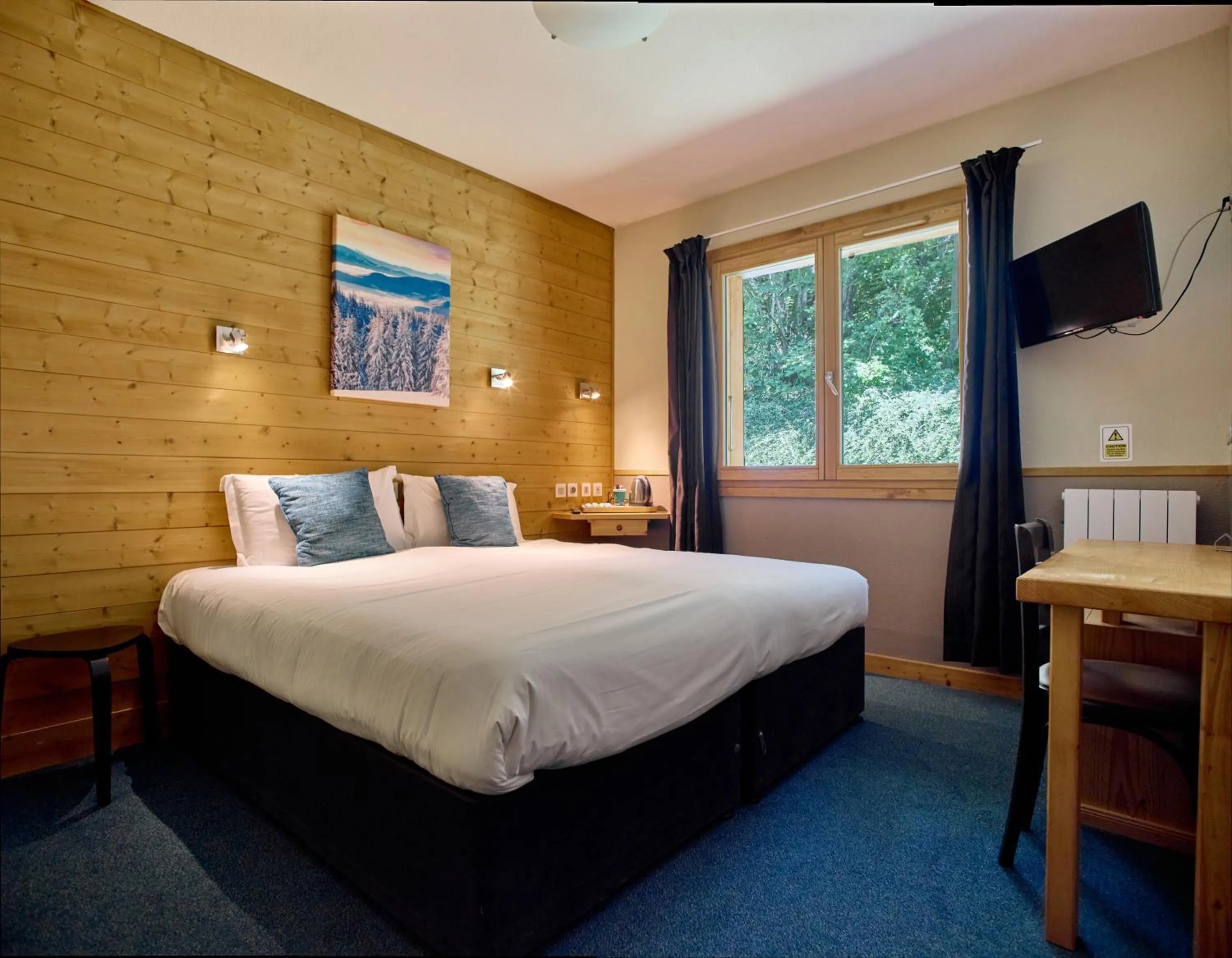 Bed in Hôtel Les Grangettes