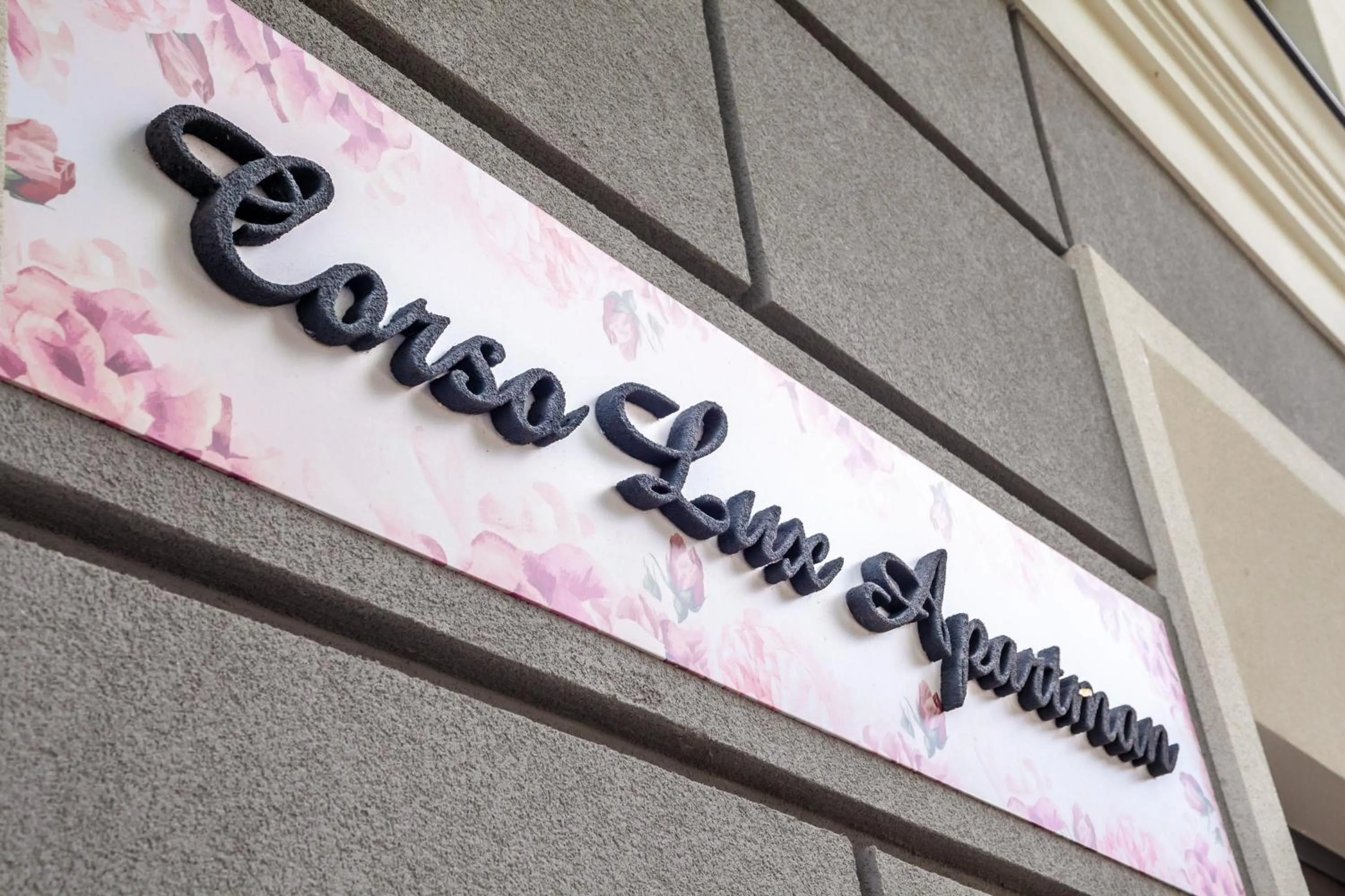 Property logo or sign in Corso Lux Apartman