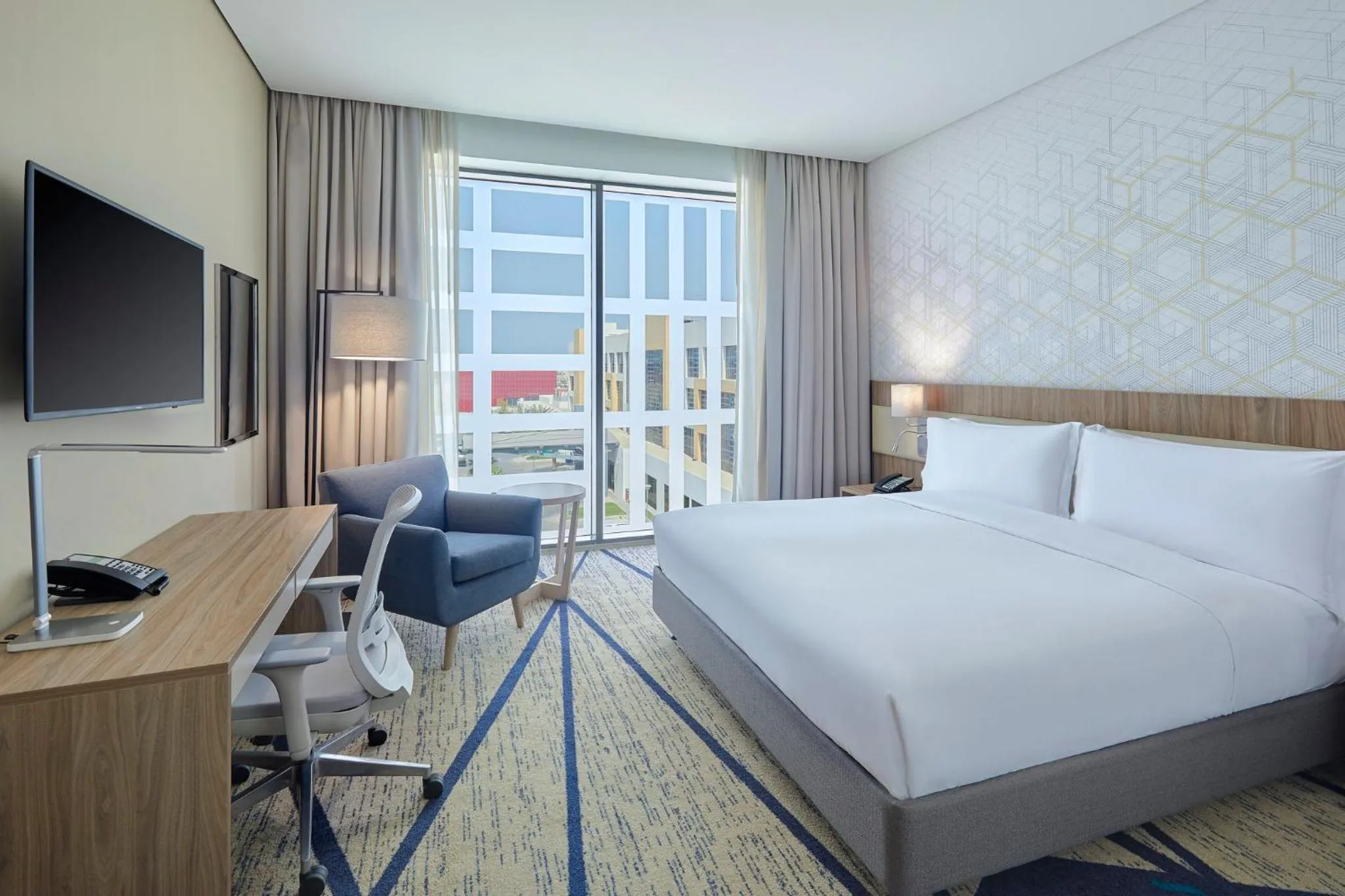 Photo of the whole room, Bed in Holiday Inn & Suites Al Jubail by IHG