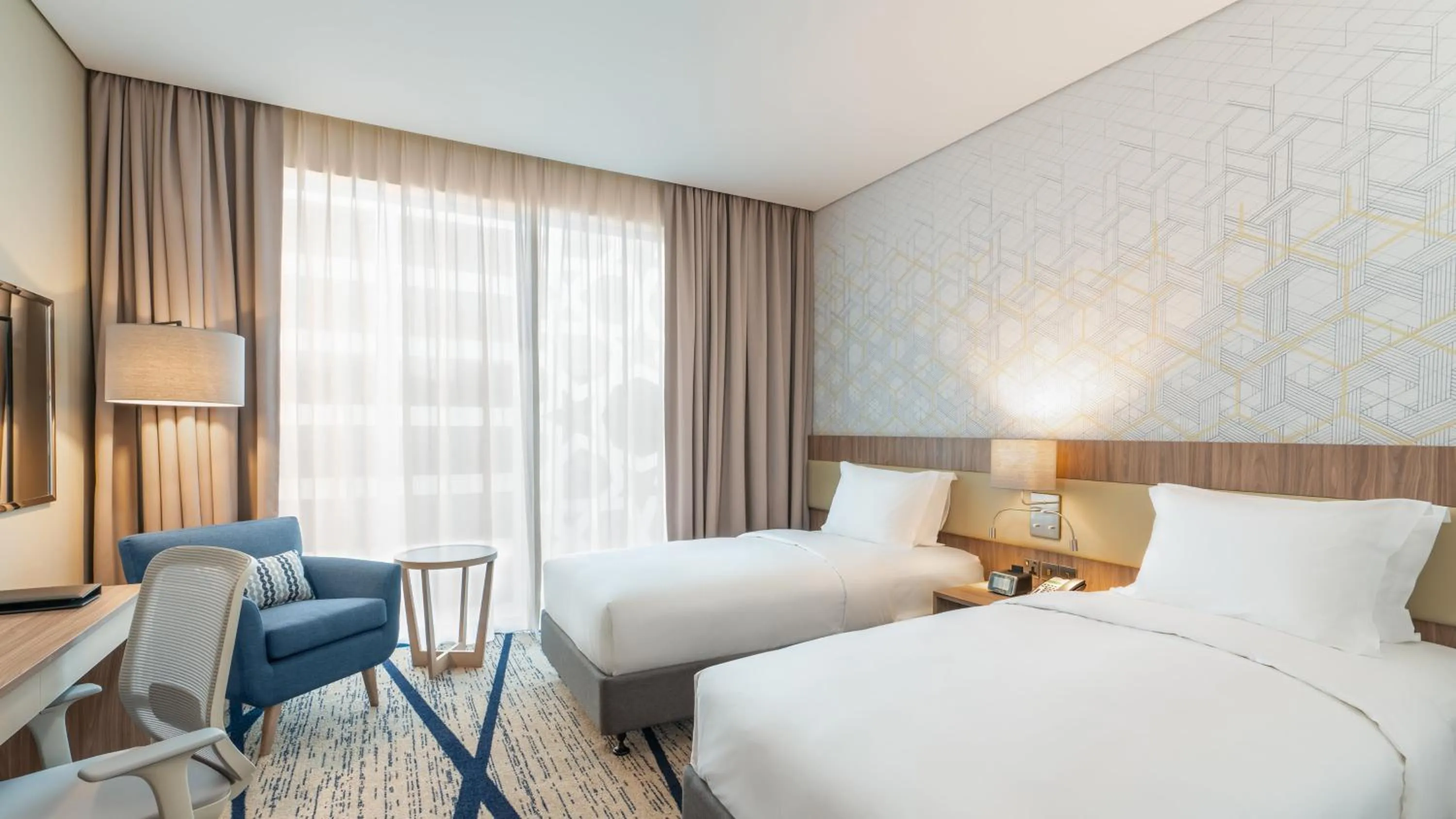 Photo of the whole room, Bed in Holiday Inn & Suites Al Jubail by IHG