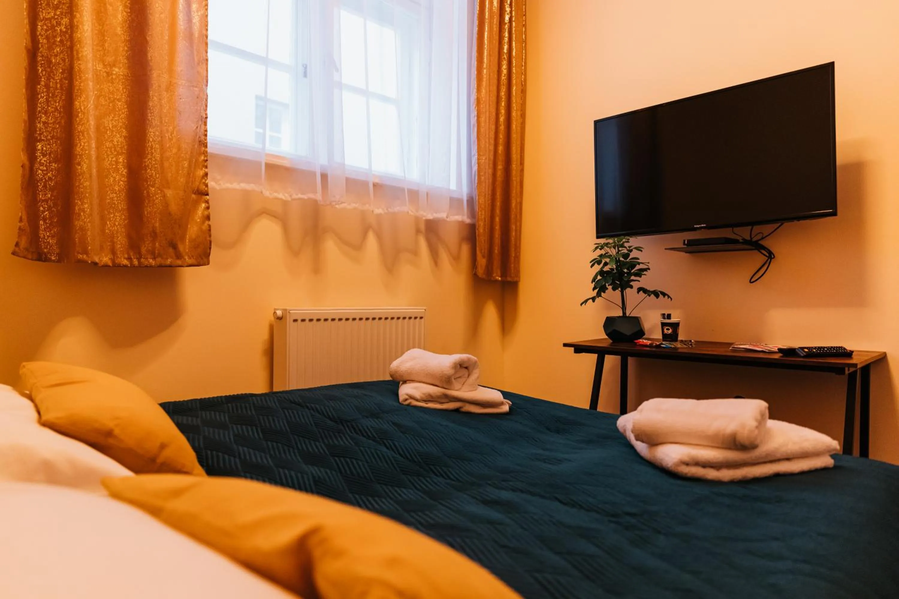 Bed in Kamieniczka Palladium