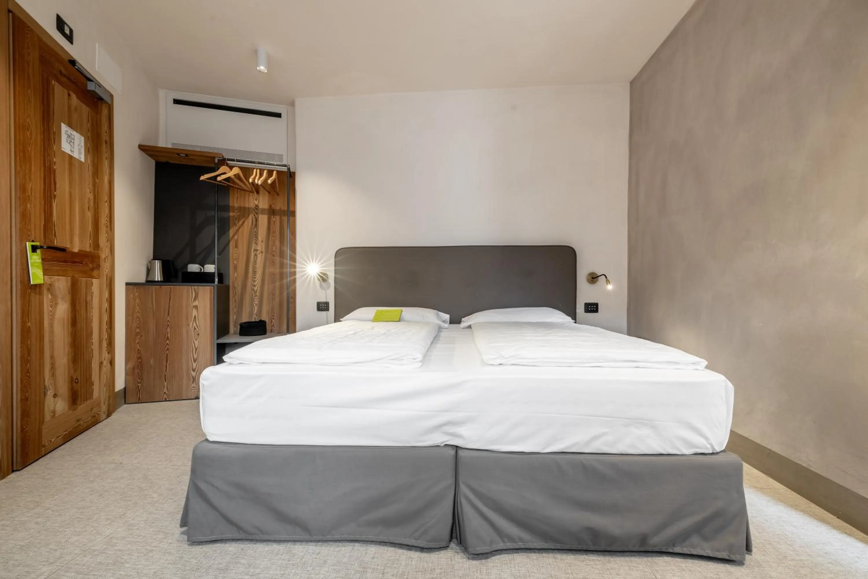 Bed in Curt di Clement Eco Mobility Hotel