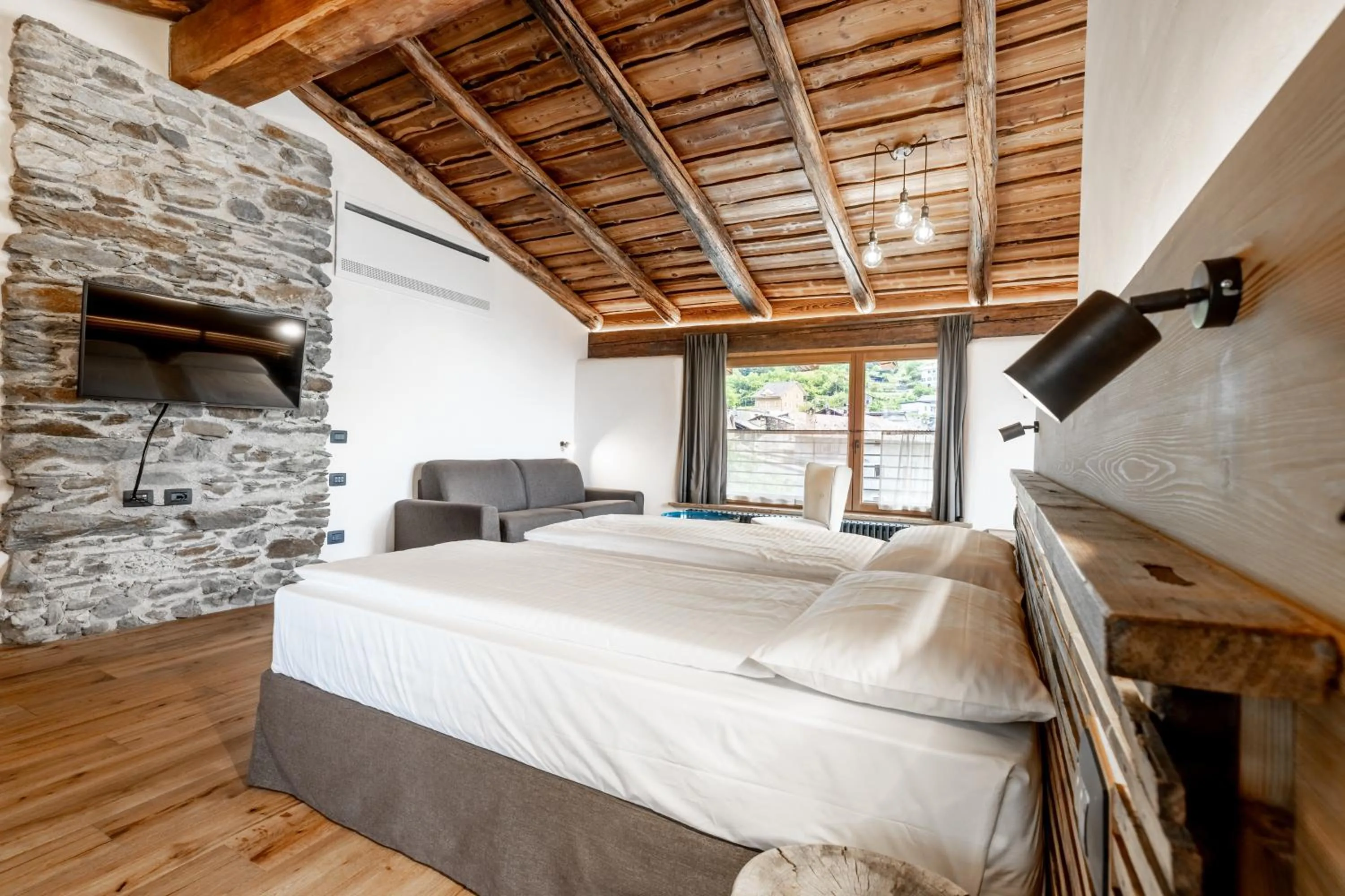 Bed in Curt di Clement Eco Mobility Hotel