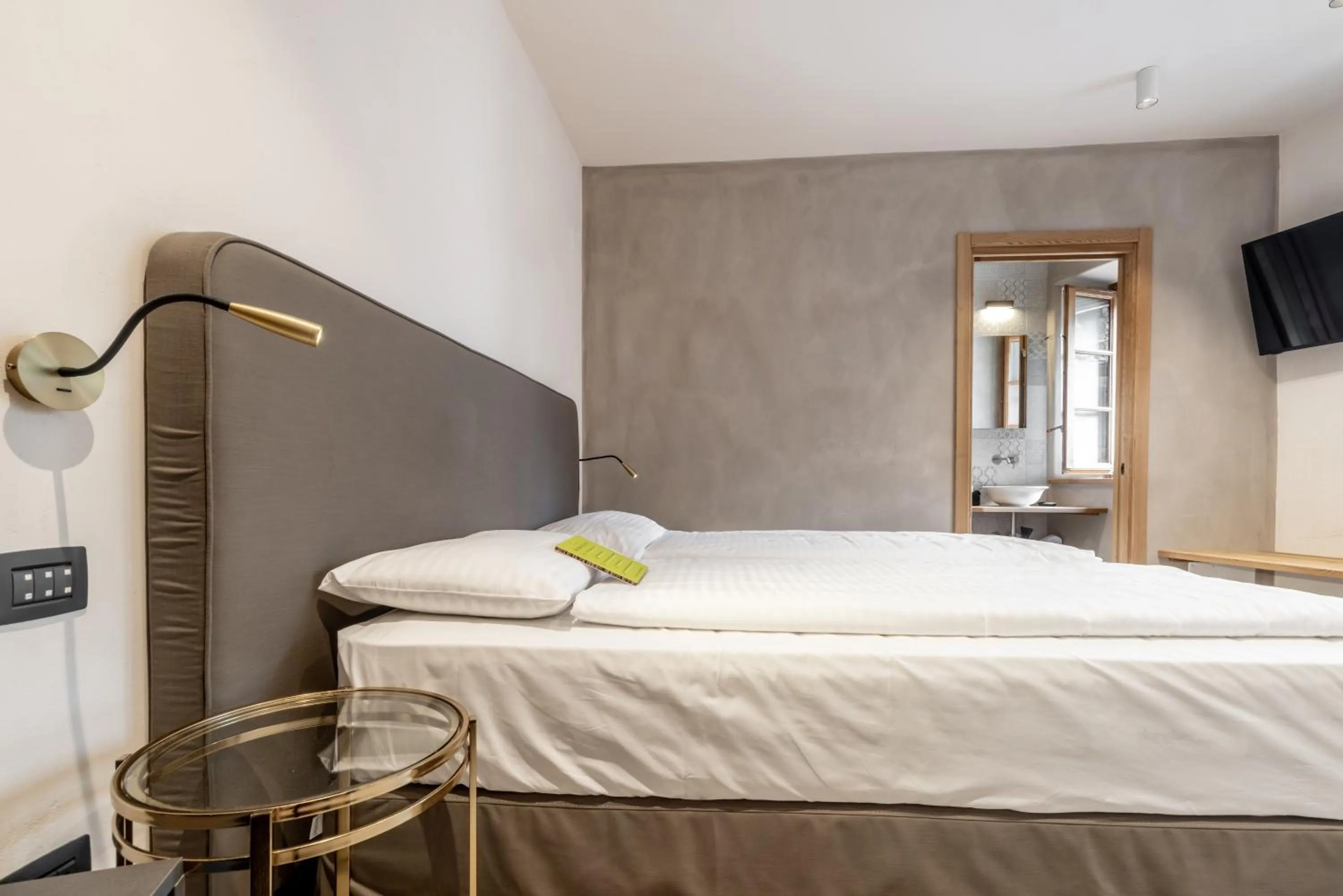 Bed in Curt di Clement Eco Mobility Hotel