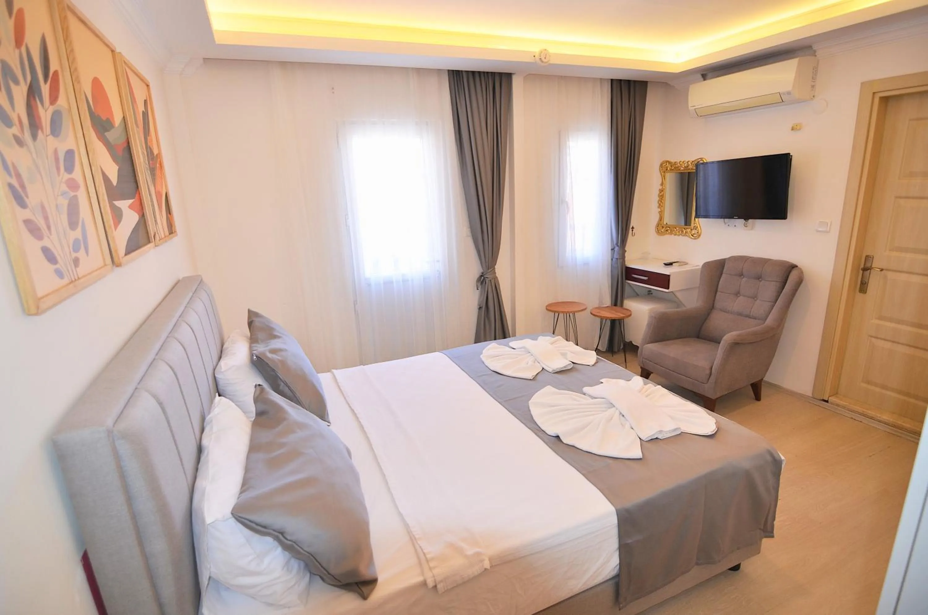 Bed in Mykonut Apart Hotel