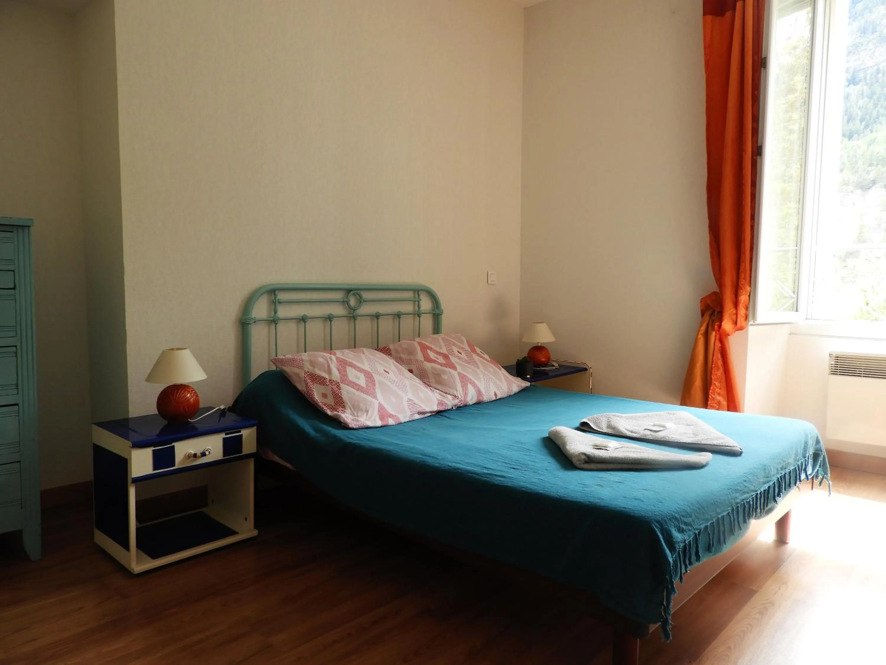 Bed in Le Relais des Cavaliers