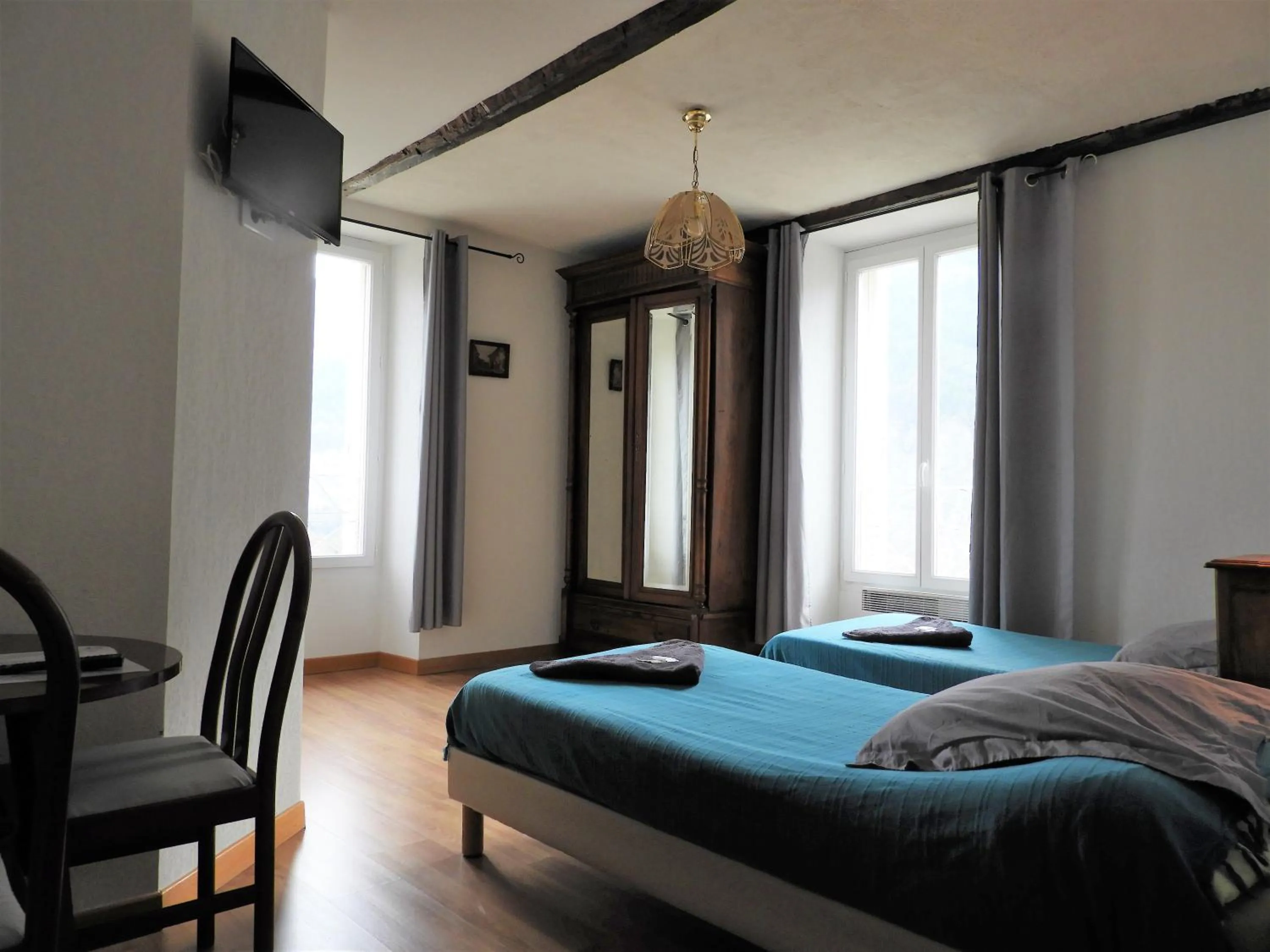 Bed in Le Relais des Cavaliers