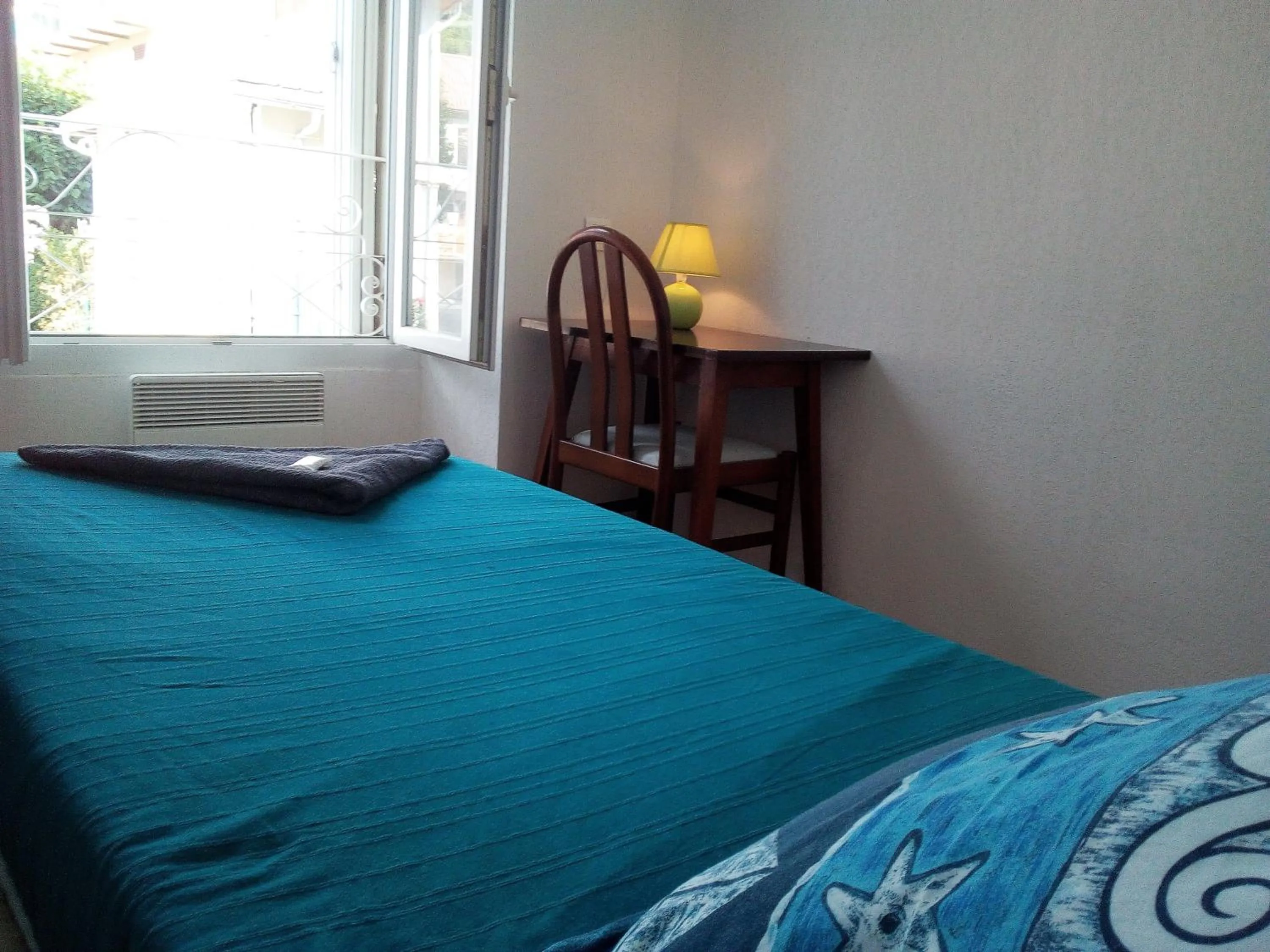 Bed in Le Relais des Cavaliers