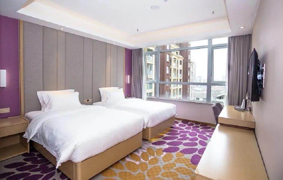 Bed in Lavande Hotel Neijiang High-speed Railway Station Peace Plaza