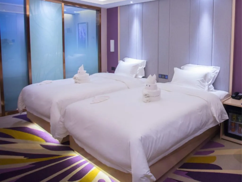 Bed in Lavande Hotel Korla city government swan lake