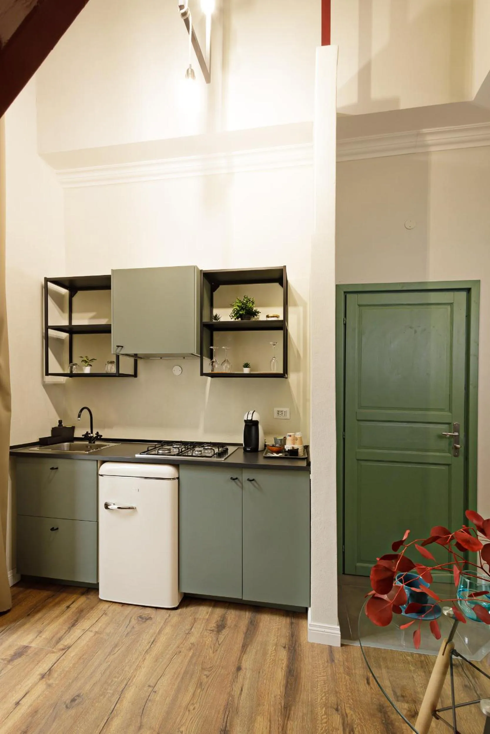 Kitchen or kitchenette in Palà Suites