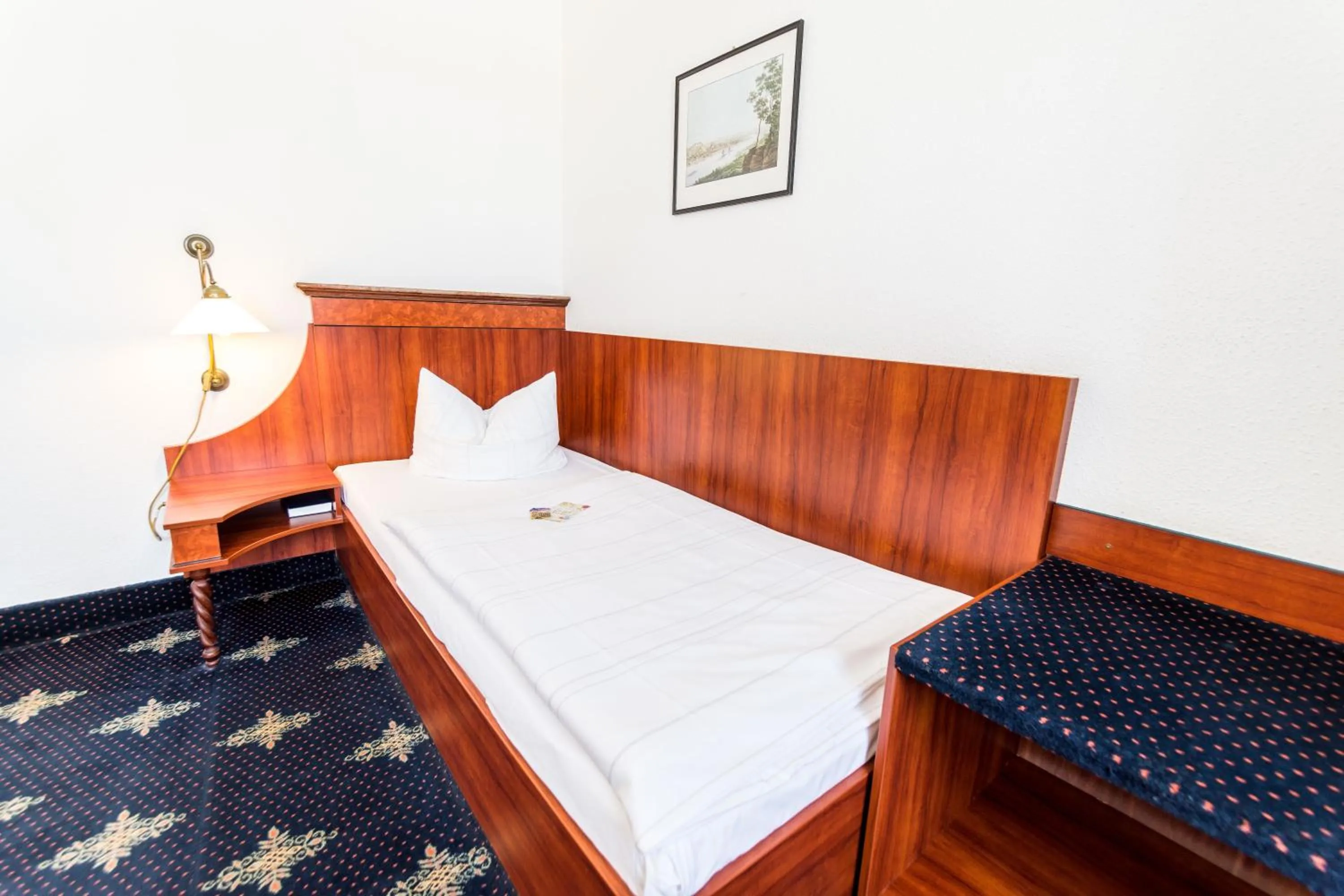 Photo of the whole room, Bed in Hotel Wilder Mann Annaberg-Buchholz