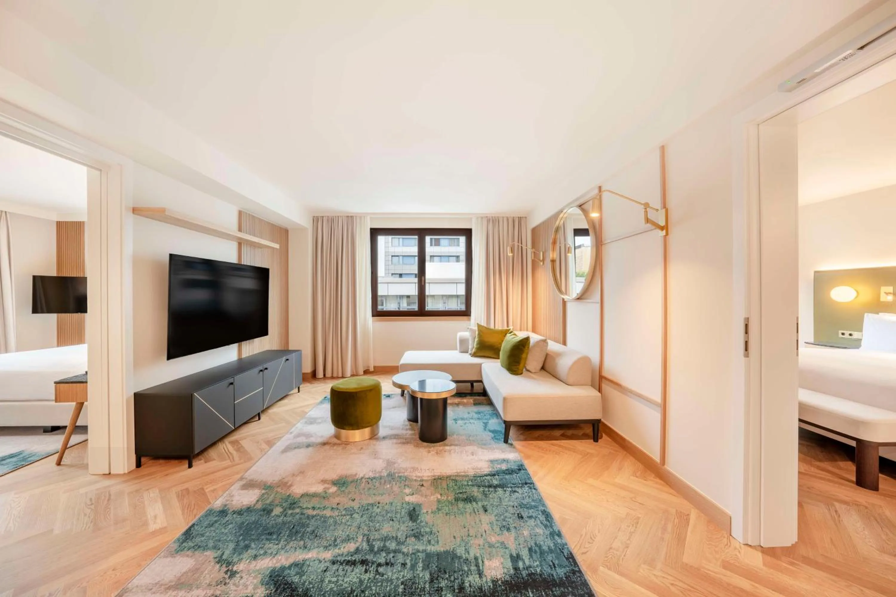 Living room, Bed in Hilton Berlin