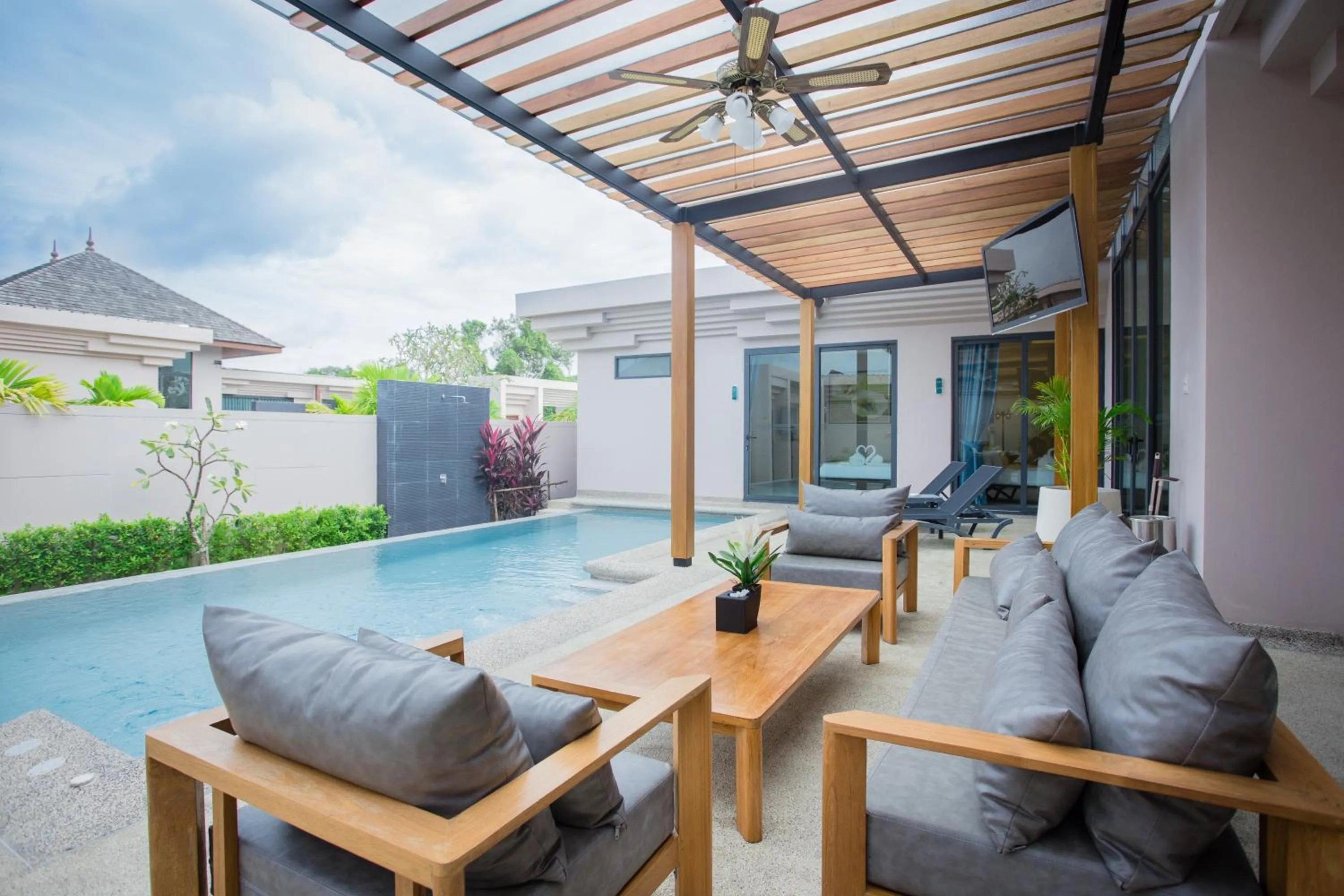 Swimming pool in Gold Chariot Pool Villa, Phuket - SHA Plus Certified