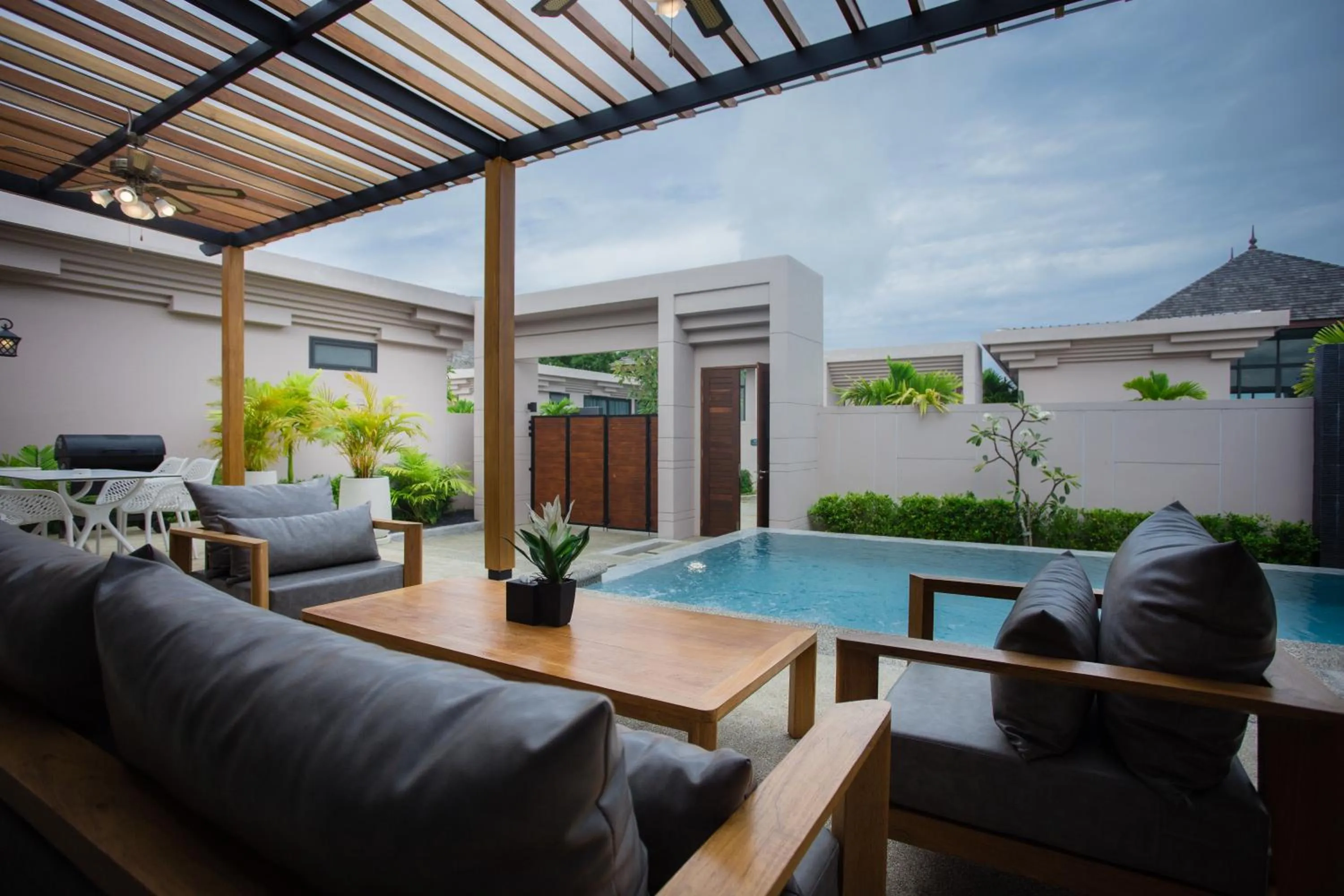 Swimming pool in Gold Chariot Pool Villa, Phuket - SHA Plus Certified