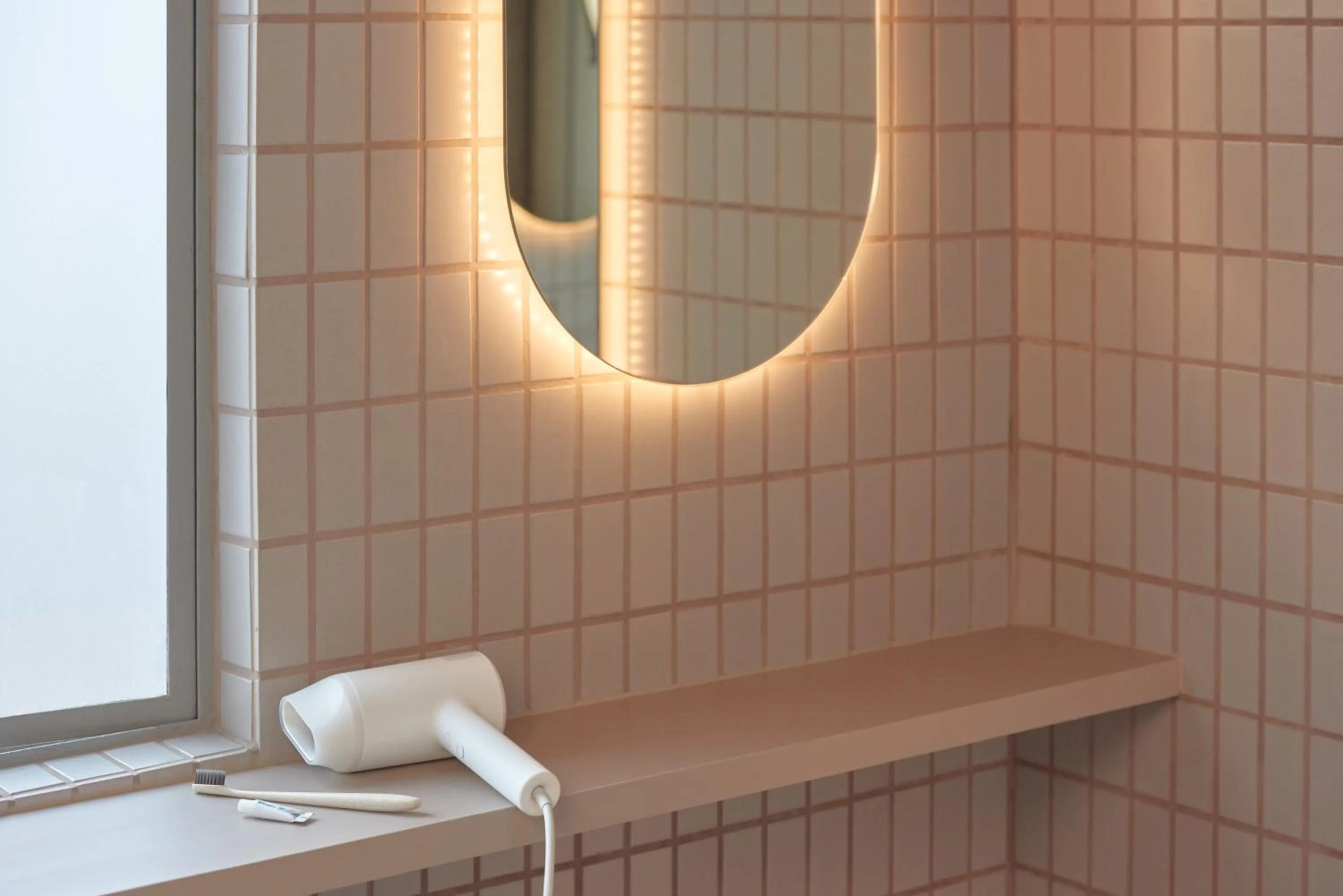 Bathroom in KINN Capsule - HER Space, Female Only