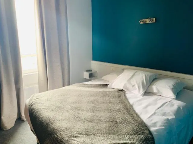 Bedroom in Hôtel-Restaurant La Bergerie