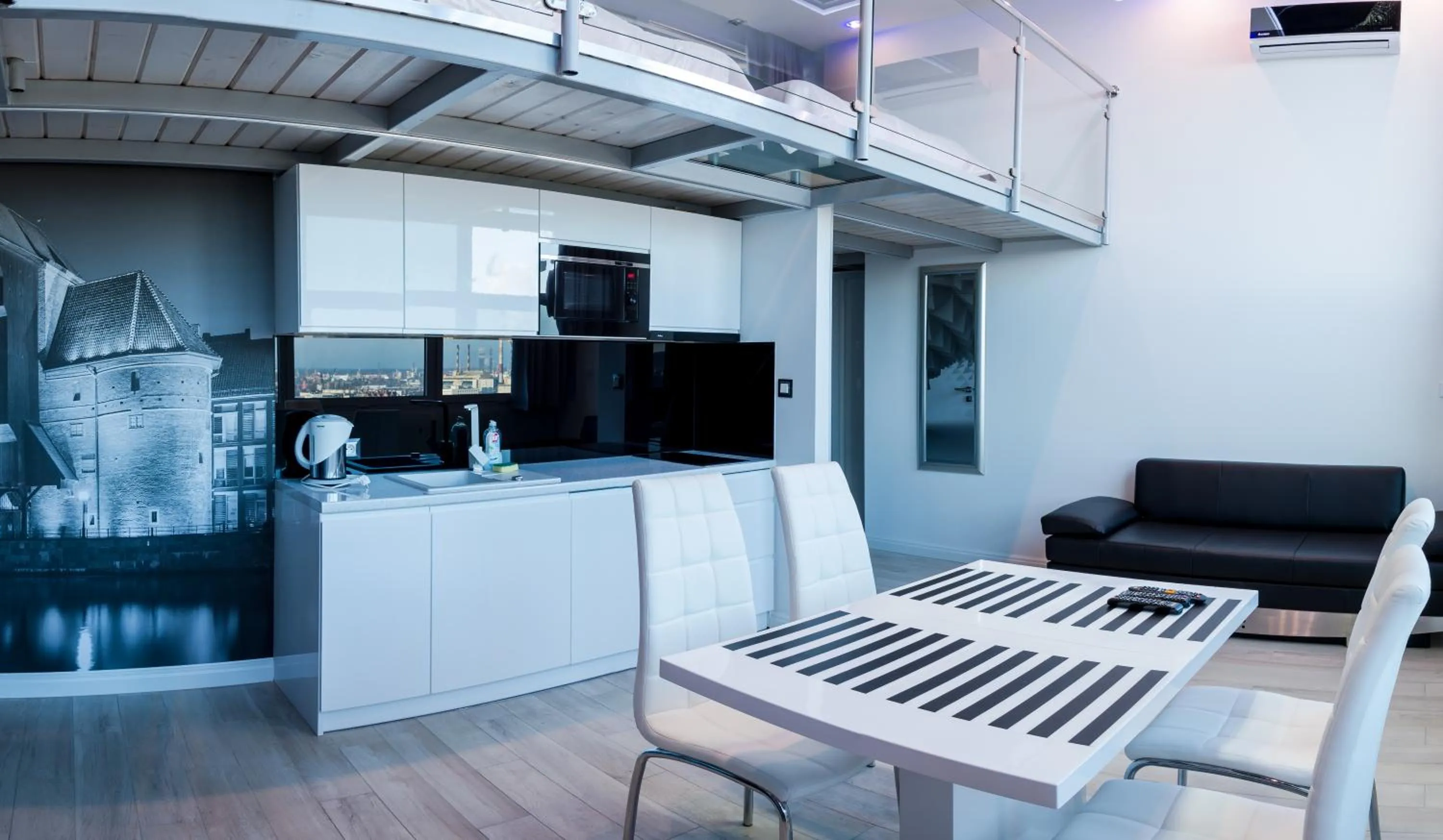 TV and multimedia in Panorama- the View of Gdańsk by Elite Apartments