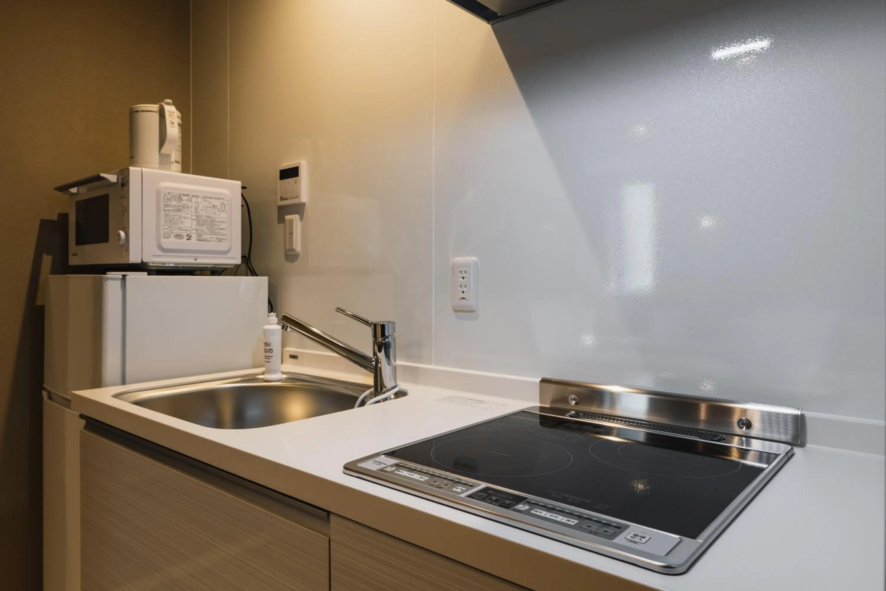 Kitchen or kitchenette in GRAND BASE Yakuin Odori