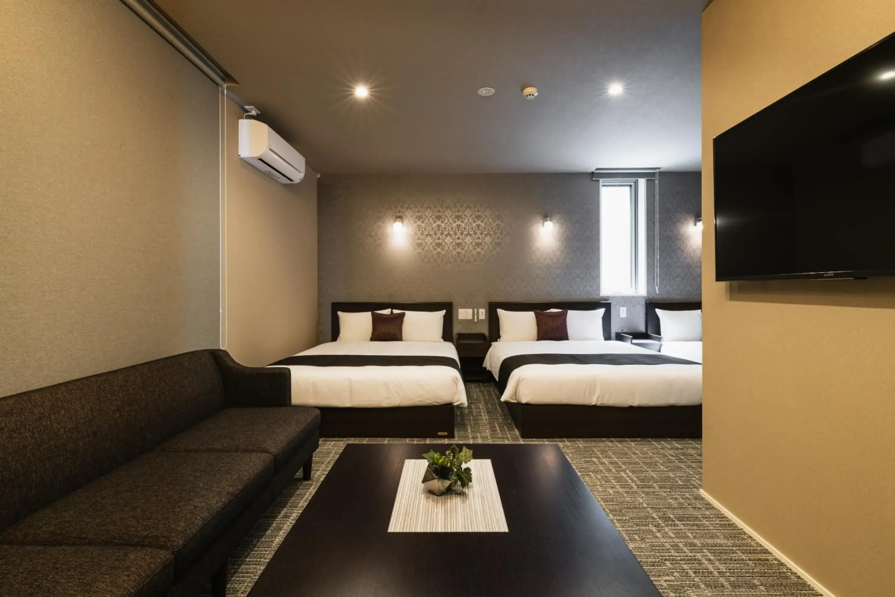 Photo of the whole room, Bed in GRAND BASE Yakuin Odori Photo of the whole room, Bed in GRAND BASE Yakuin Odori