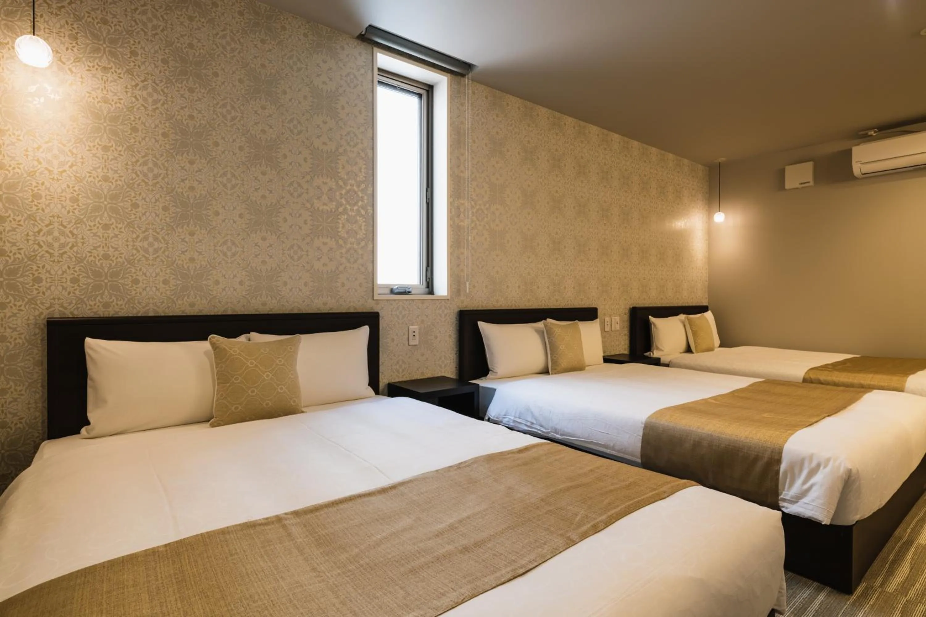 Bed in GRAND BASE Yakuin Odori