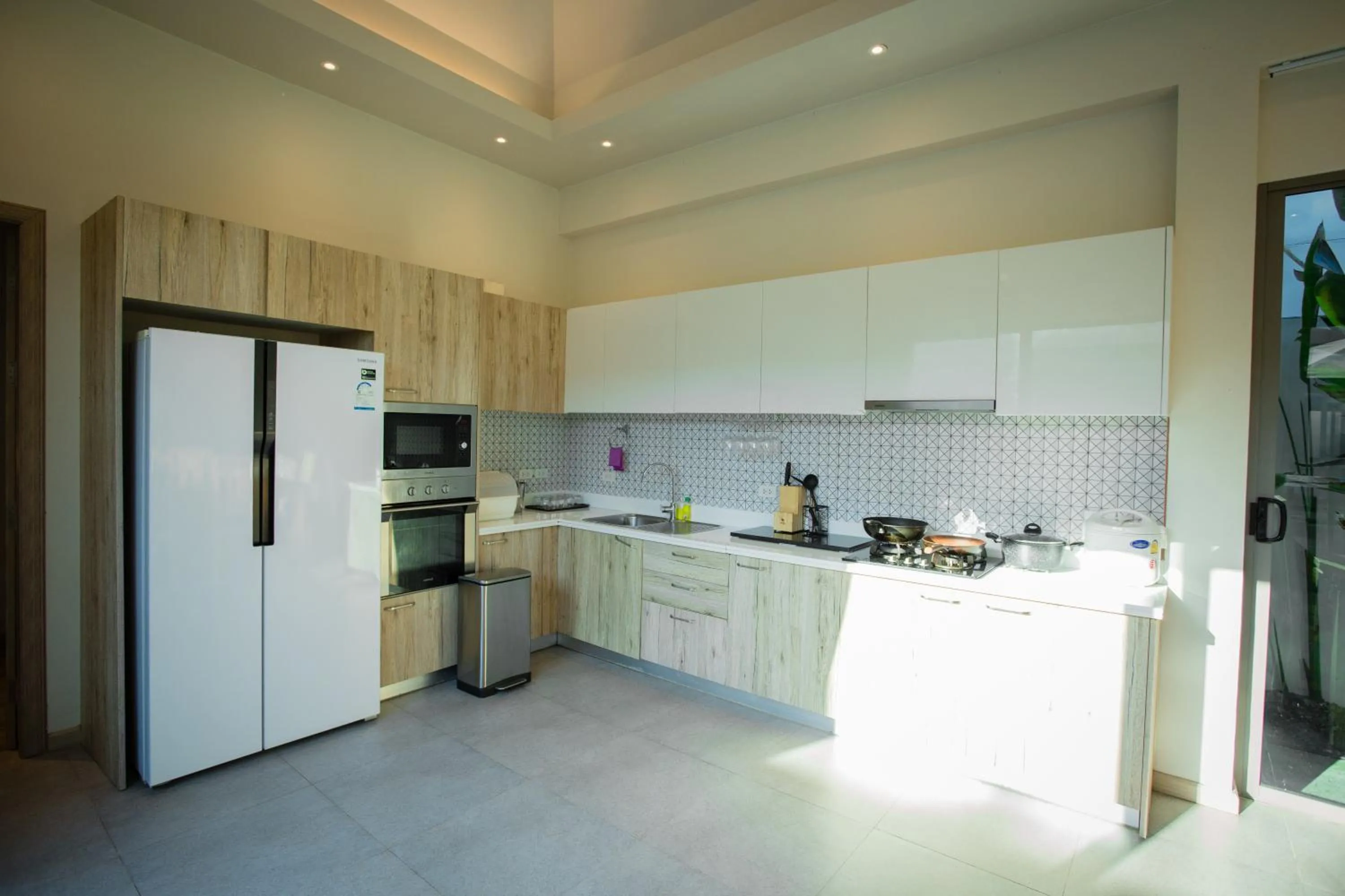 Kitchen or kitchenette in Yipmunta Pool Villa - SHA Plus Certified