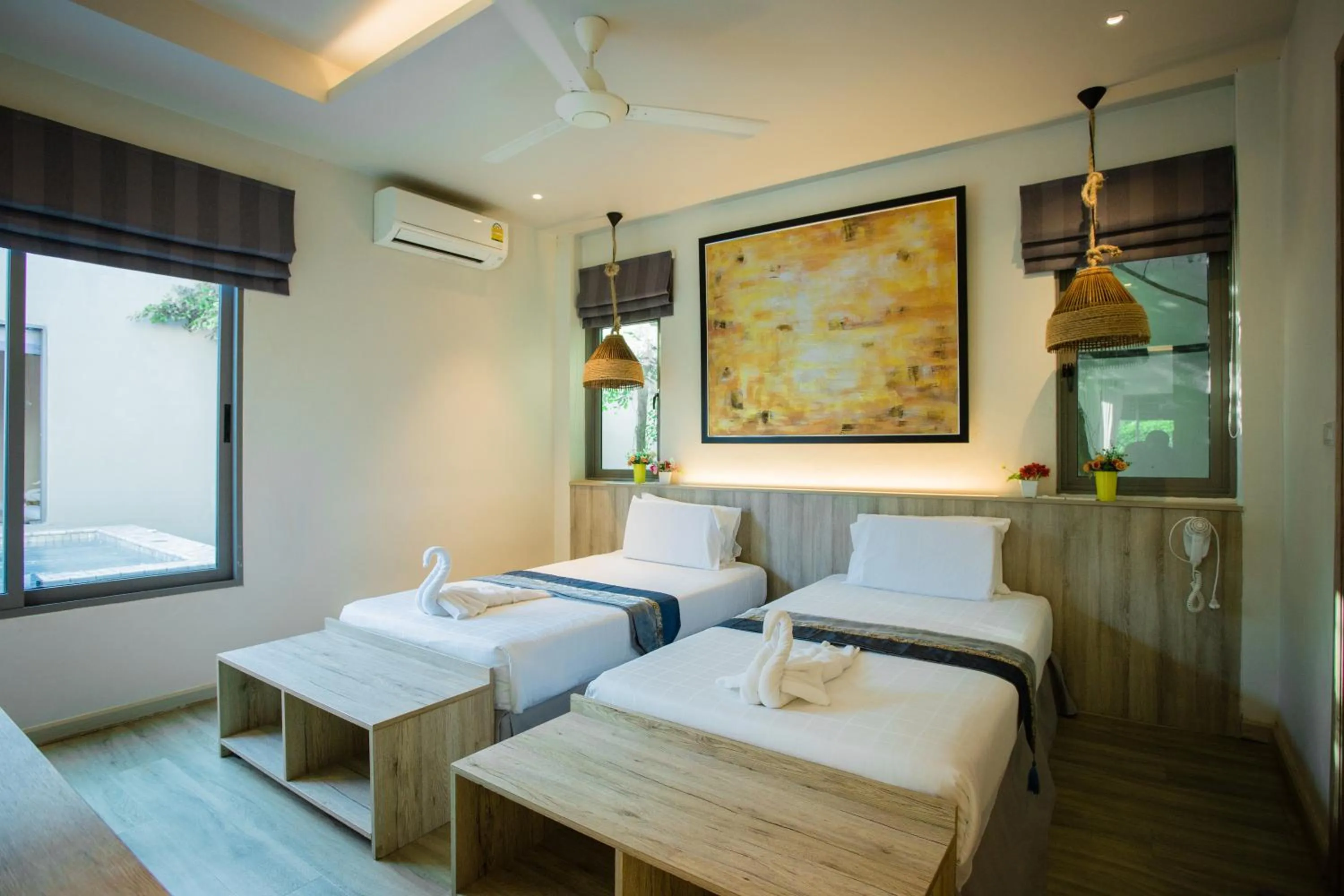 Photo of the whole room, Bed in Yipmunta Pool Villa - SHA Plus Certified