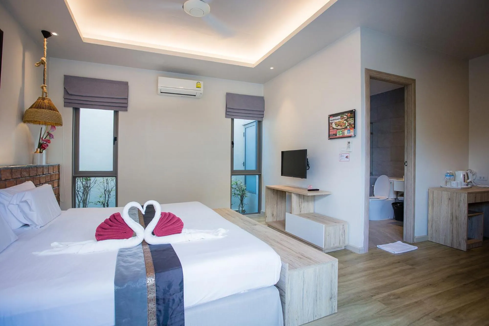 Bed in Yipmunta Pool Villa - SHA Plus Certified