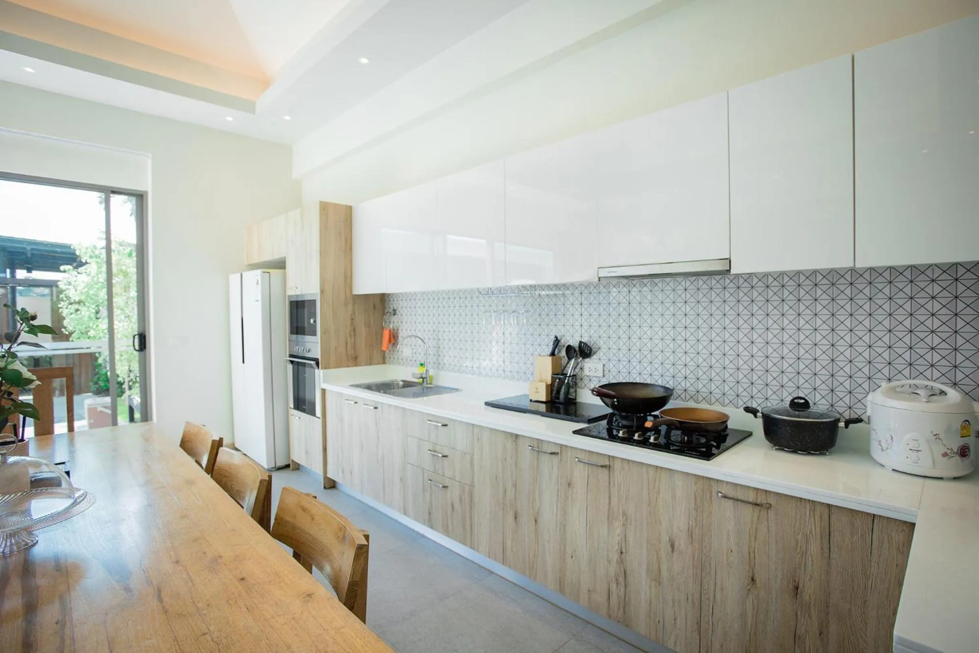 Kitchen or kitchenette in Yipmunta Pool Villa - SHA Plus Certified